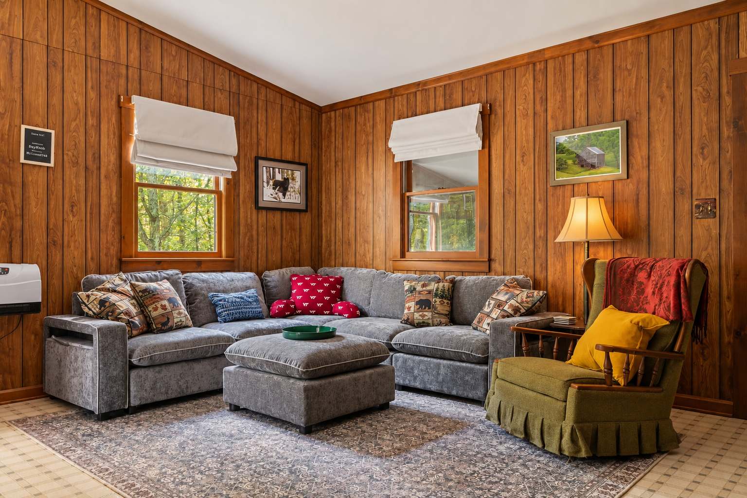 The cabin offers convenient single-level living with three bedrooms, one full bathroom, a comfortable gathering area, and a fully equipped kitchen. 