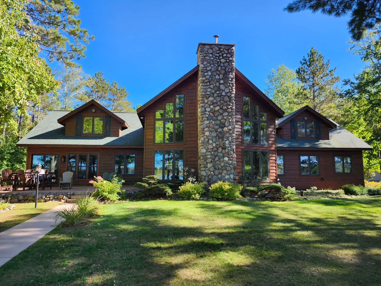 Lakefront home with game rooms, dock, kayaks, private beach, fireplace, firepit