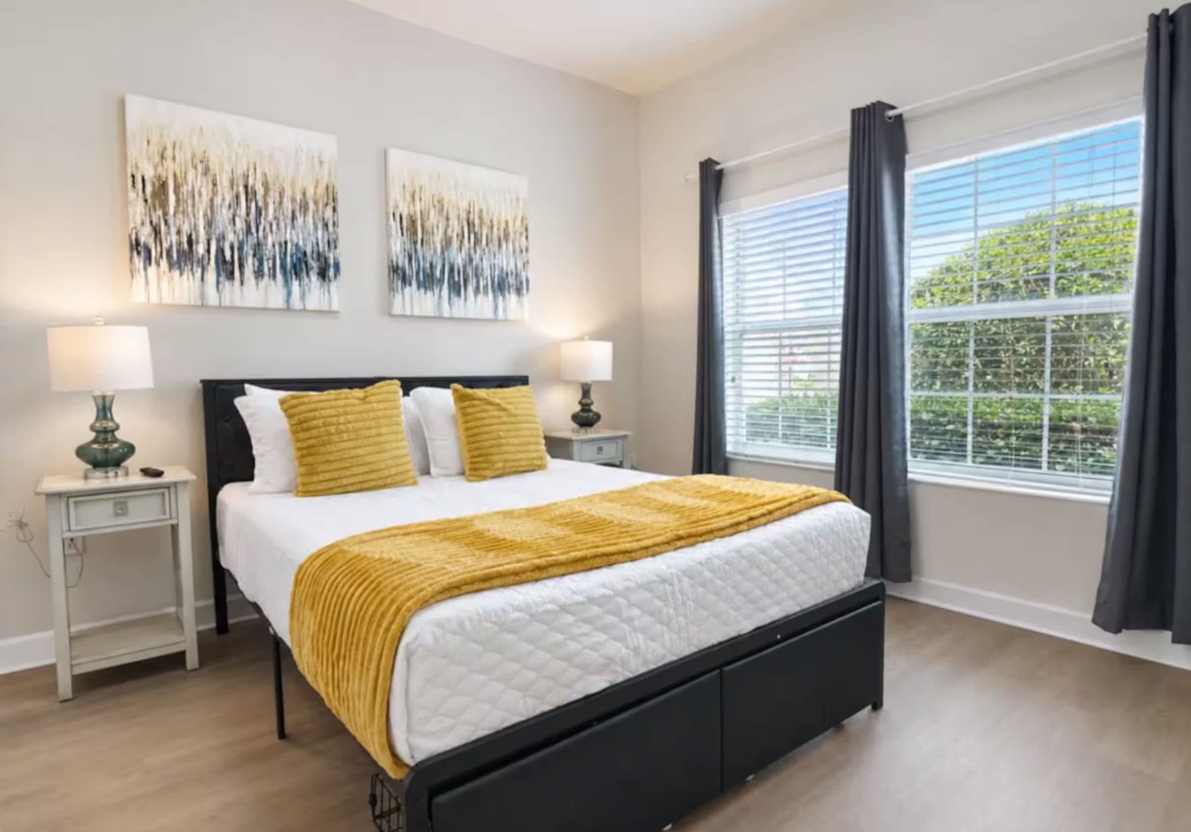 Cozy queen bedroom featuring a Smart TV for relaxing