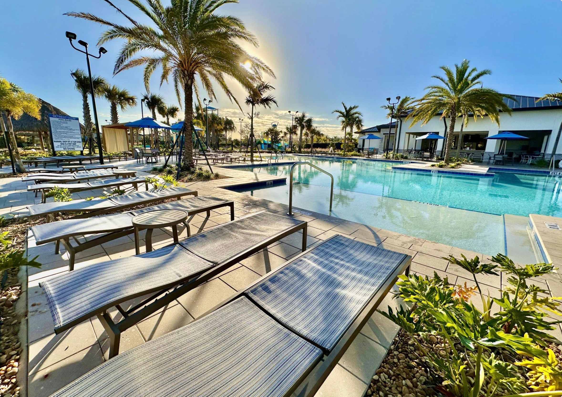 Relax, unwind, and lounge by the large community pool