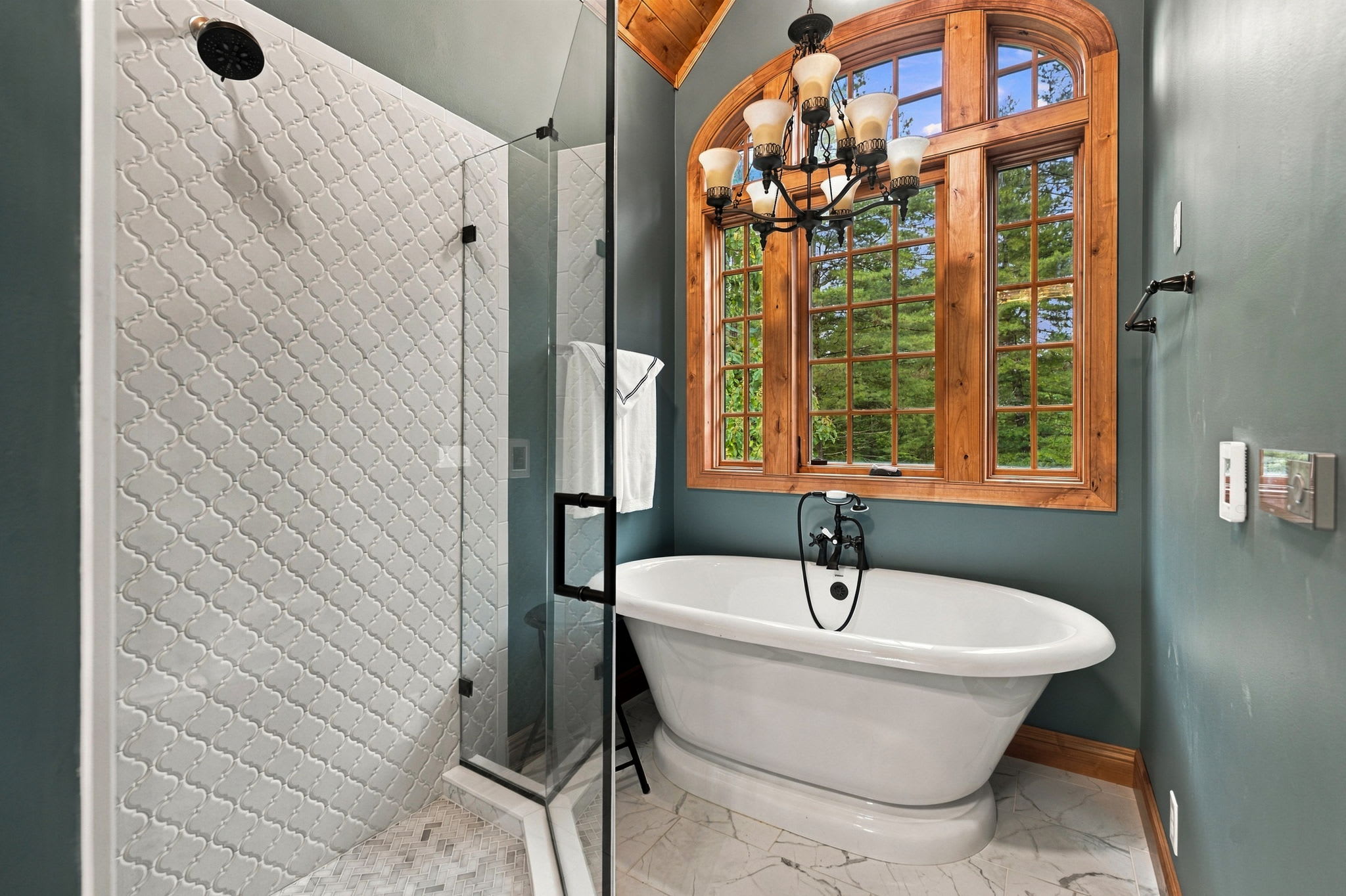 Bathroom 1 (upper level): Full bath with soaking tub and shower