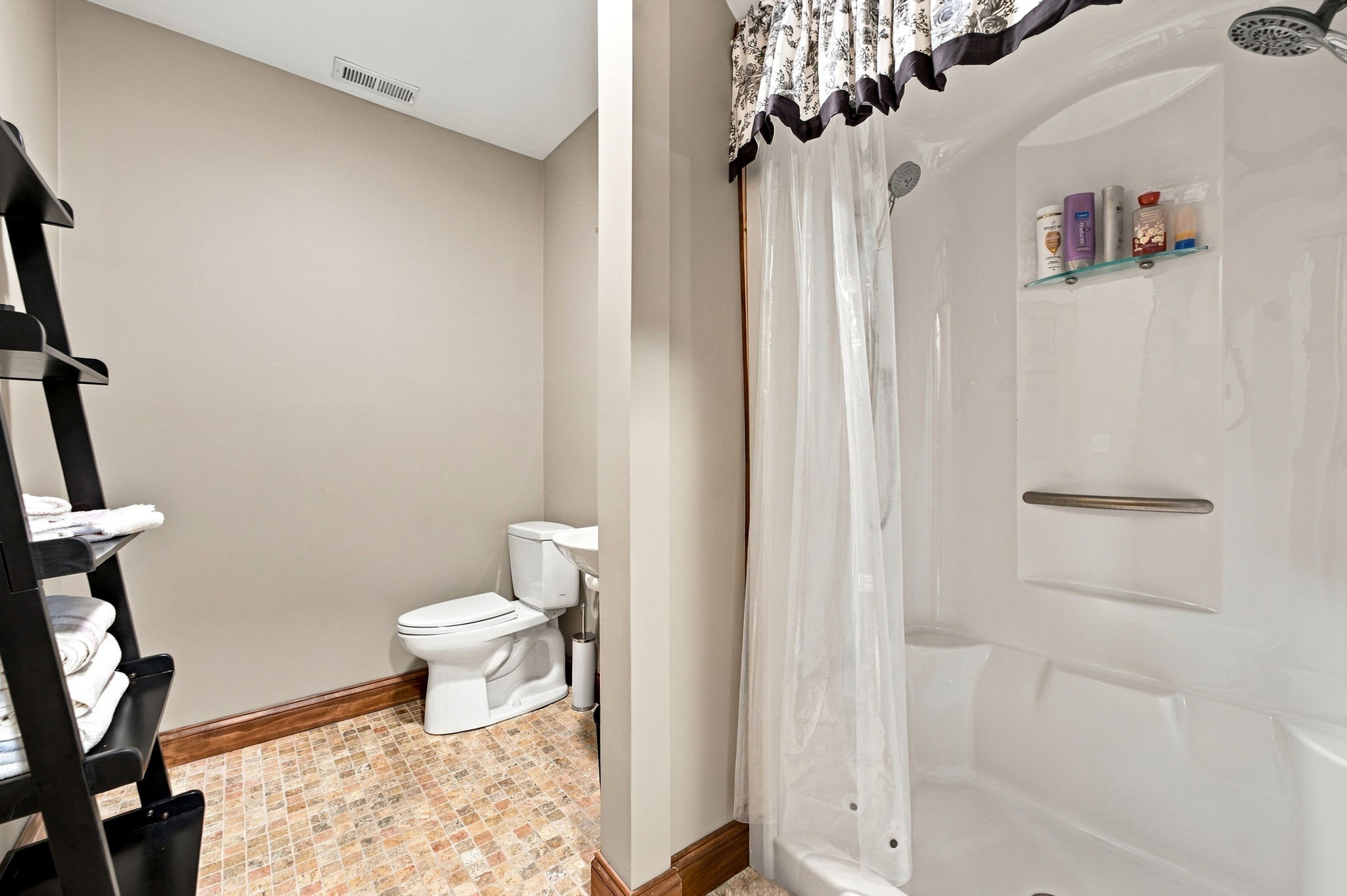 Bathroom 3 (lower level): Full bathroom with shower