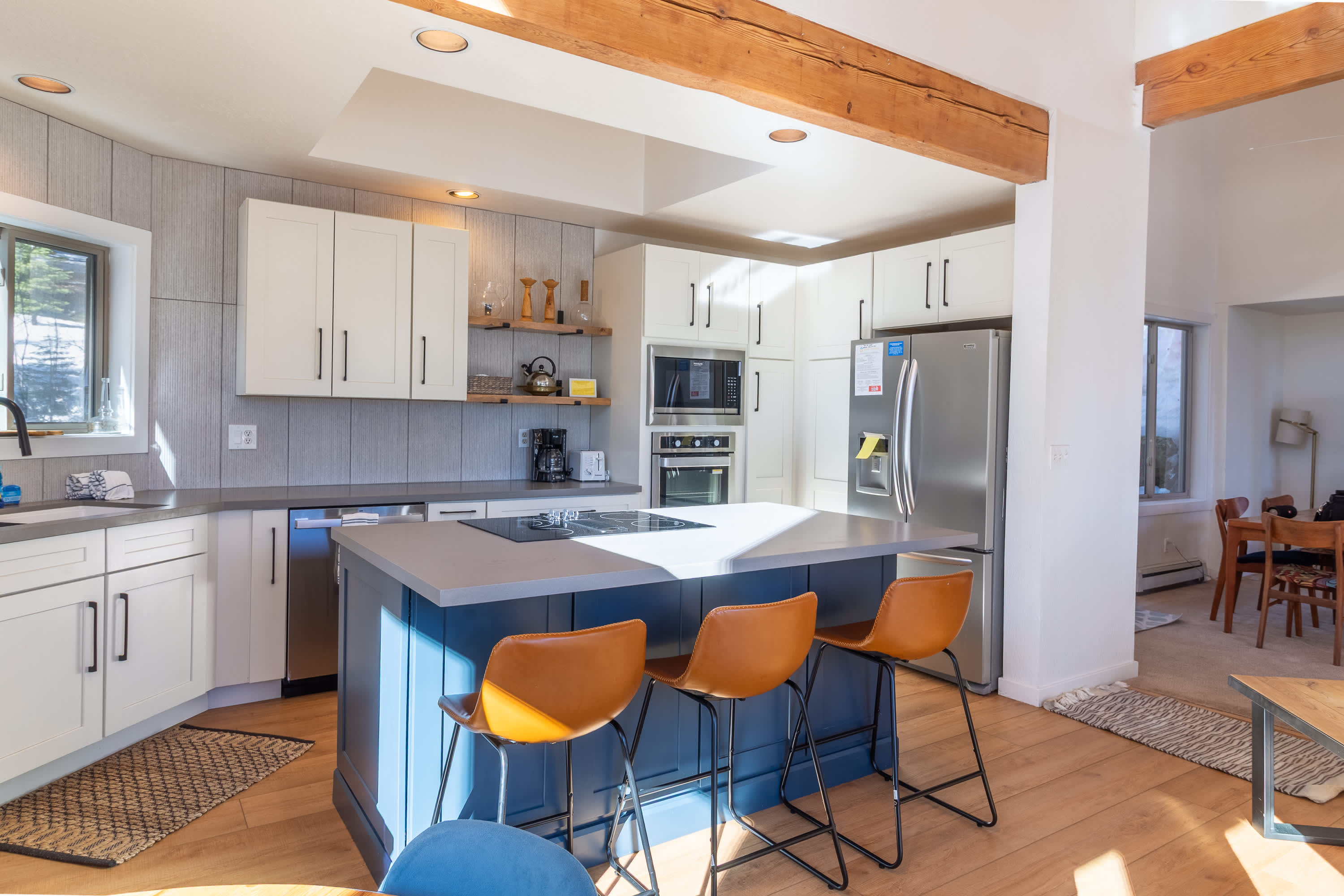 Full kitchen w/ toaster oven, drip coffee pot, Keurig, electric stovetop, double oven, and more