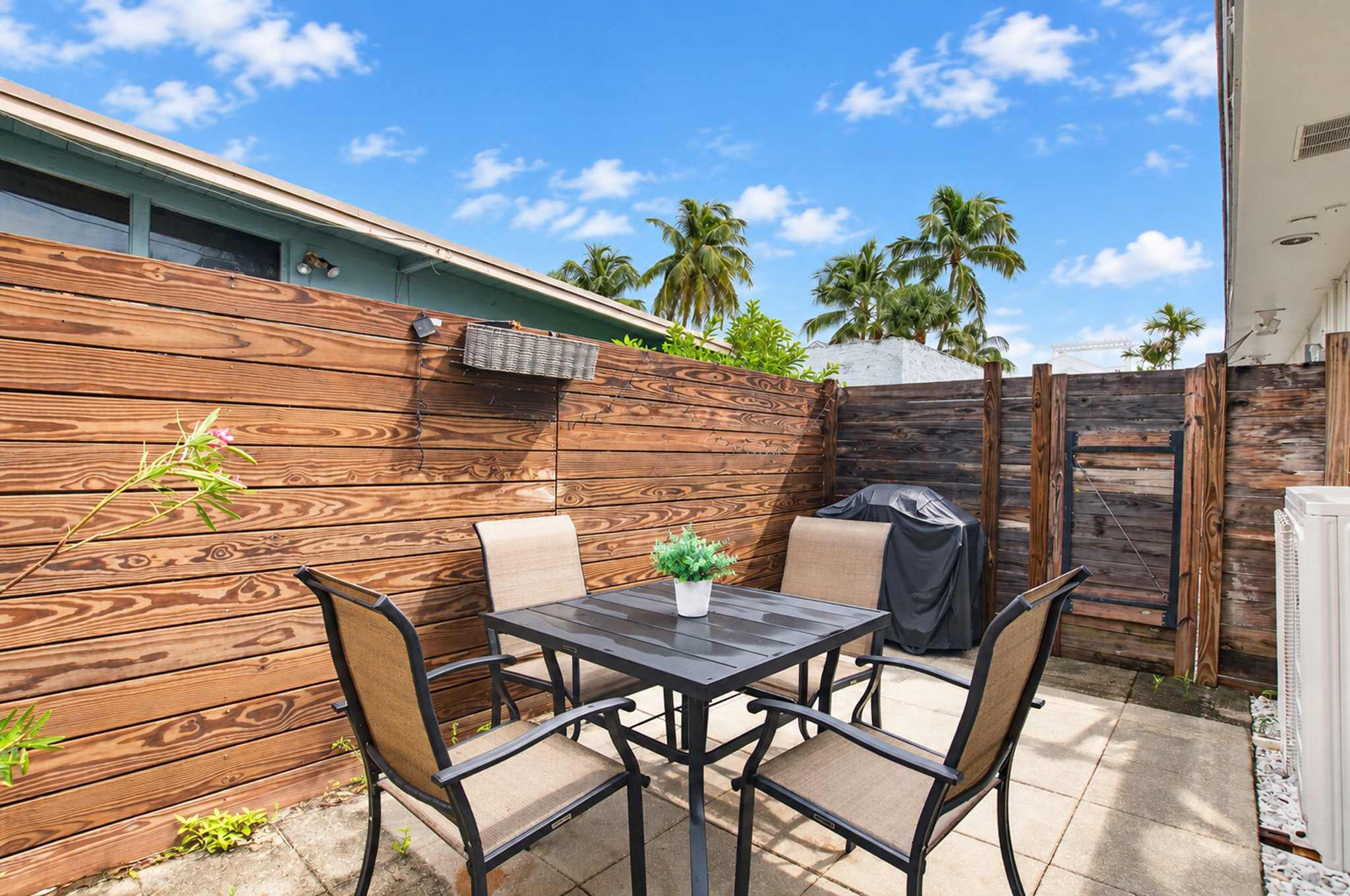 Lounge the day away or dine alfresco on the private patio​