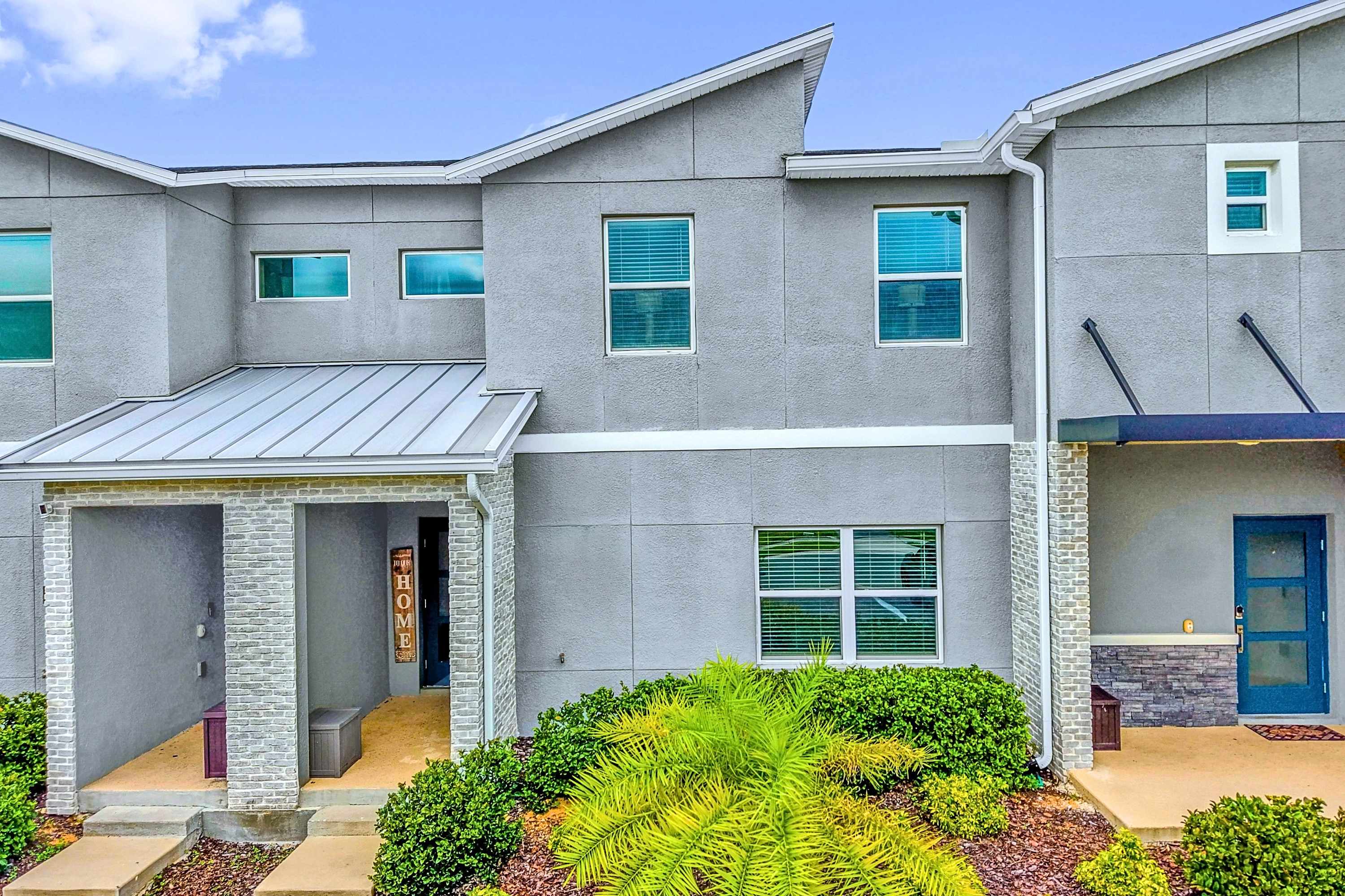 Curb appeal! Welcome to your stunning private home, minutes from Orlando attractions.