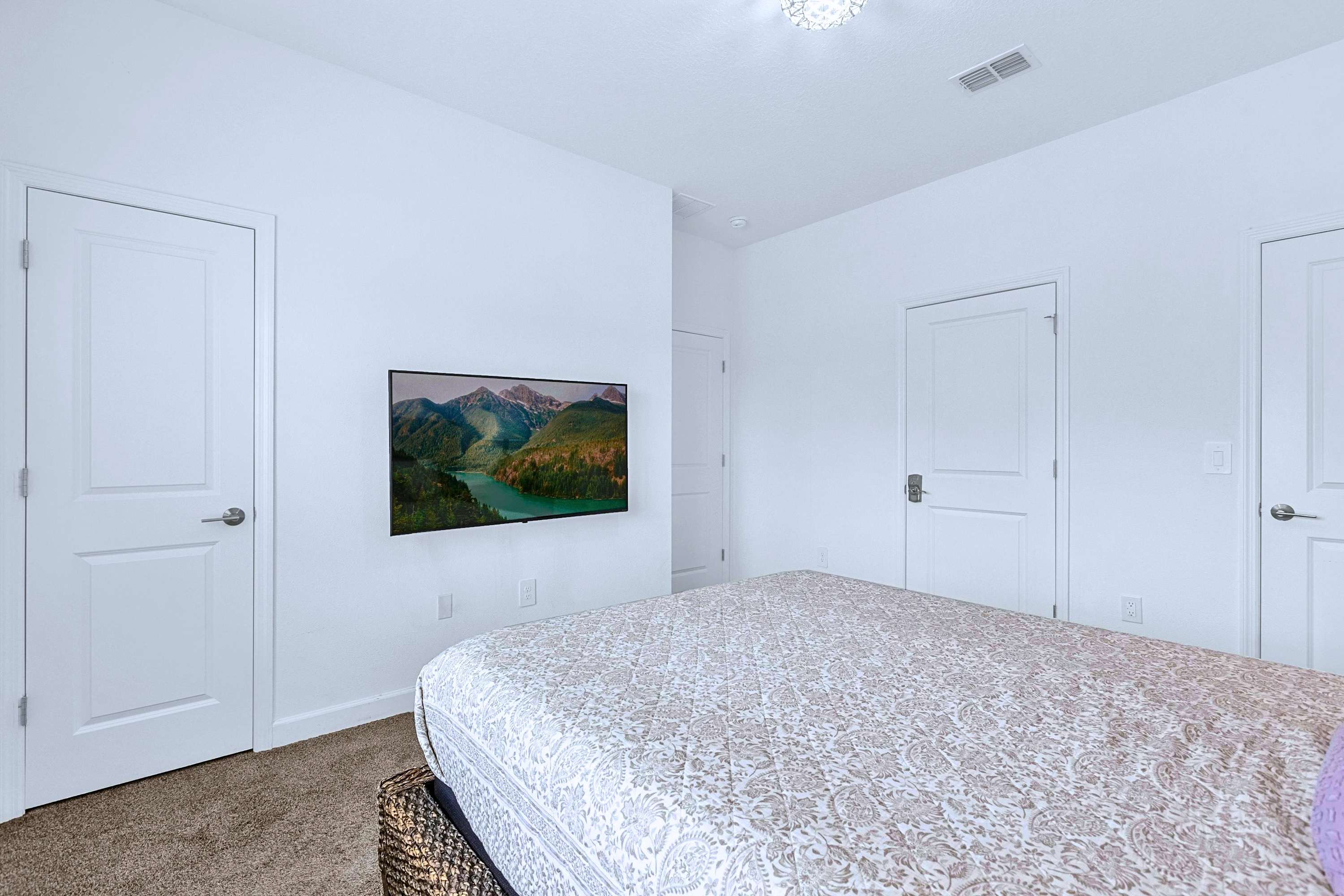 Unwind in bed with your favorite shows on the Smart TV after a full day out.