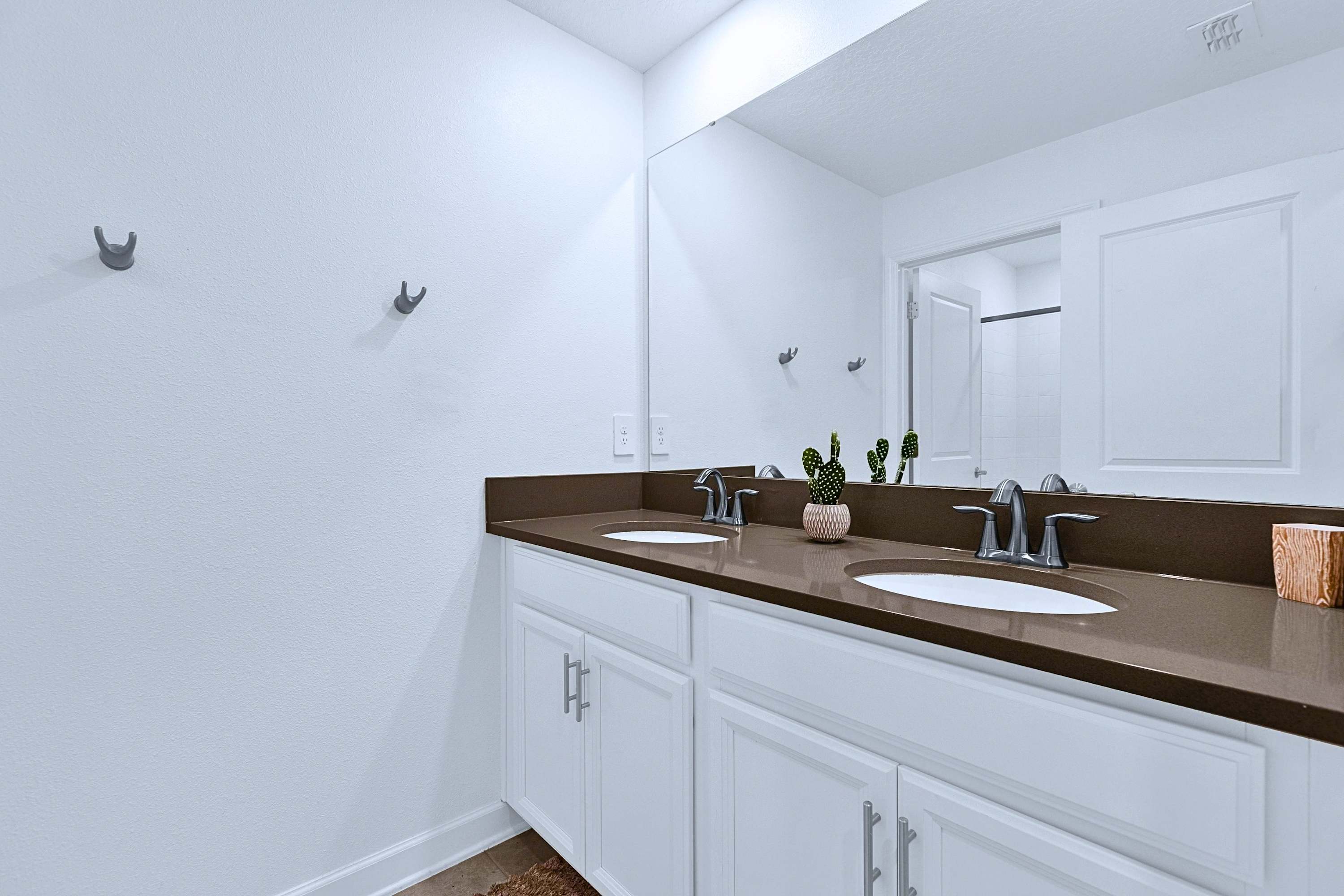 Get ready effortlessly with plenty of counter space and double sinks for the group.