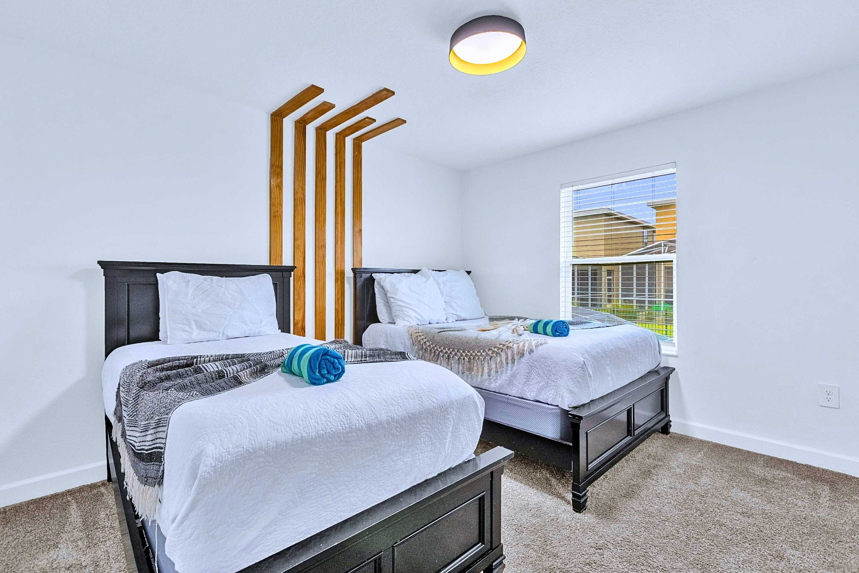 Cozy and chic twin room, perfectly designed for kids or individual guests.