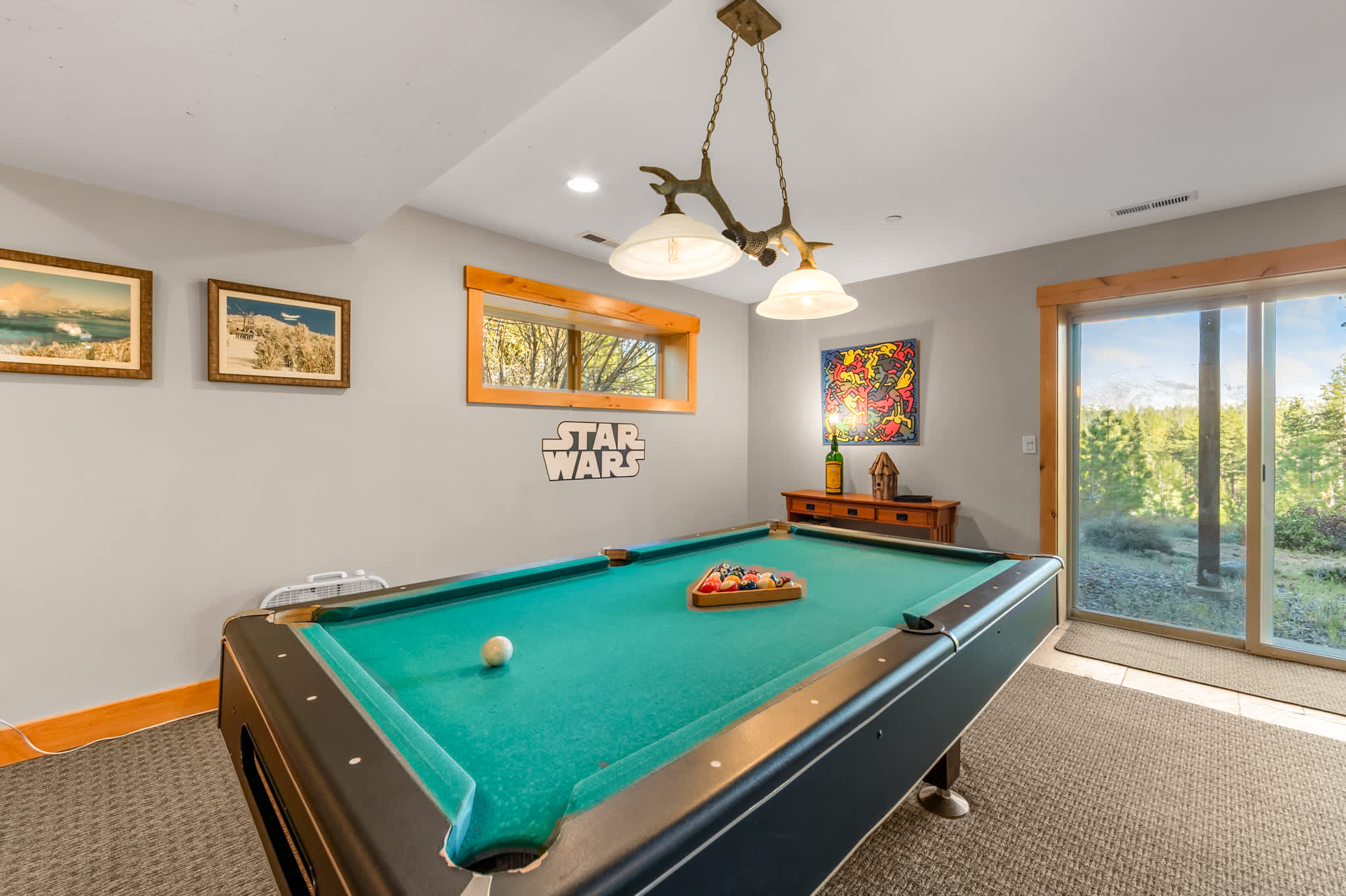 Challenge your group to a game of pool in the basement game room​