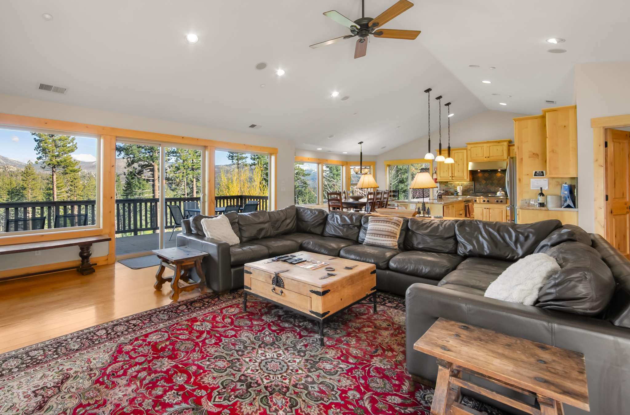 Gather and unwind in the spacious living area with ample sectional seating and a Smart TV​