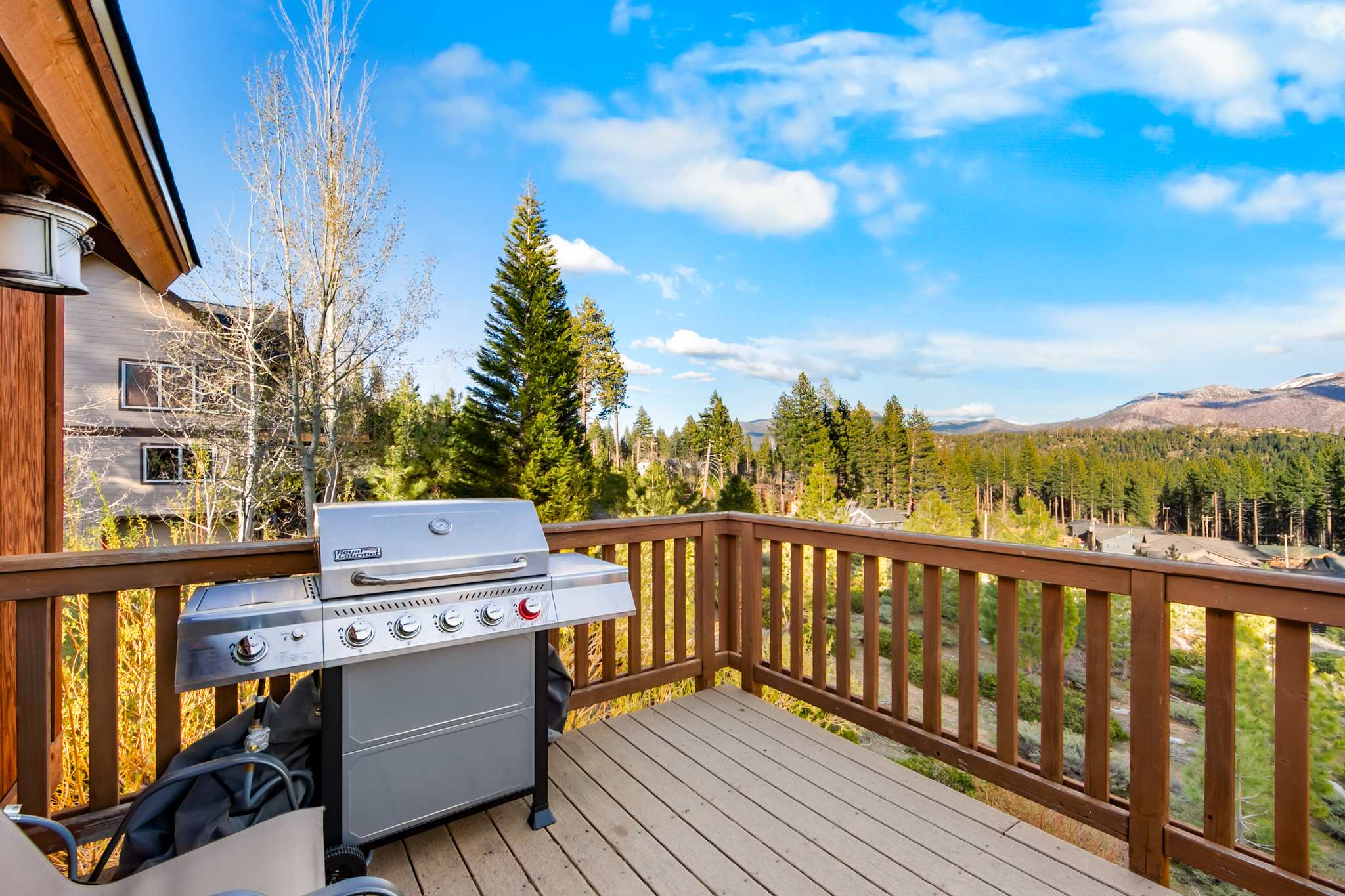 Take in the mountain views while grilling on the spacious back deck​
