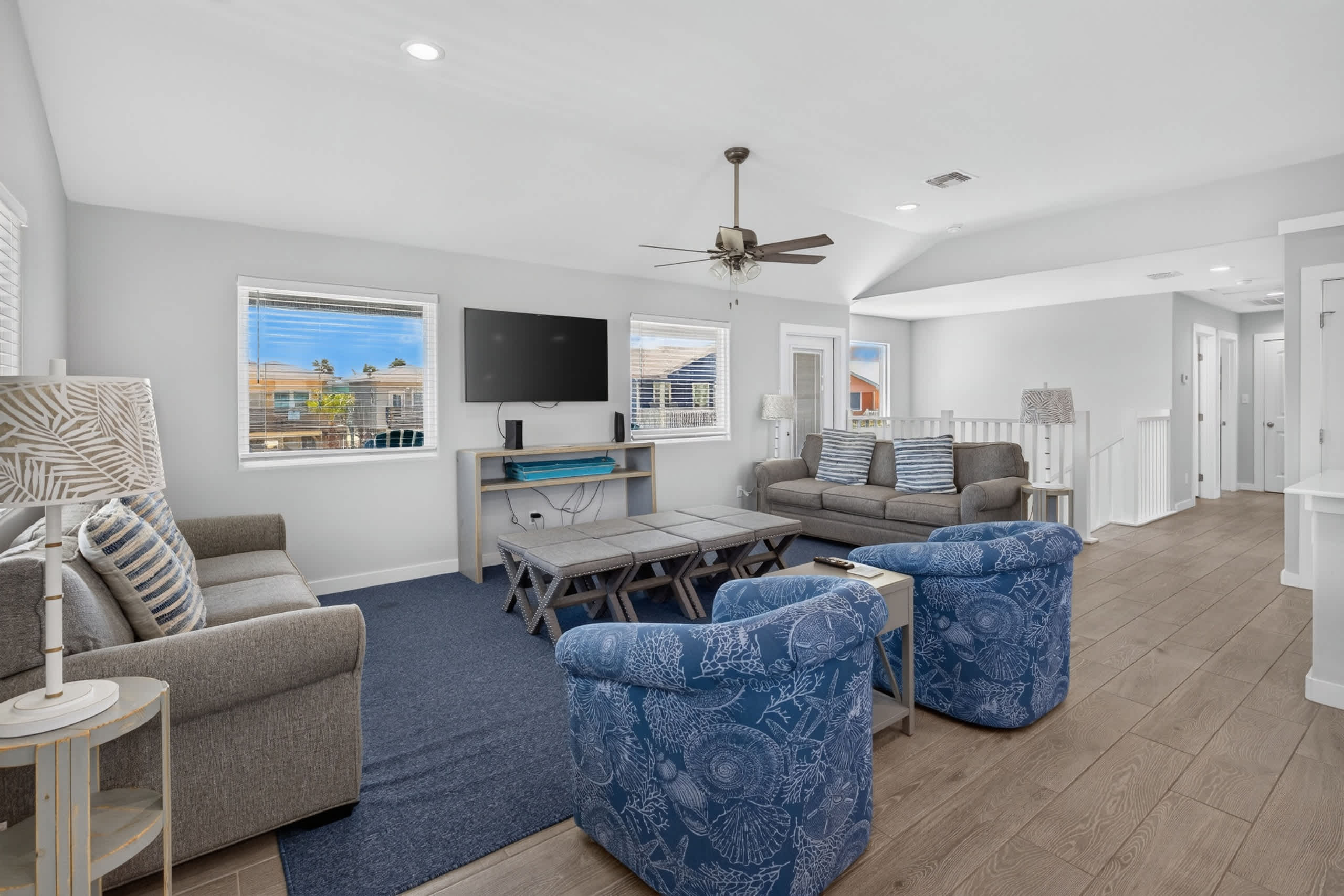 Curl up in the airy living room & stream your favorites on the smart TV​