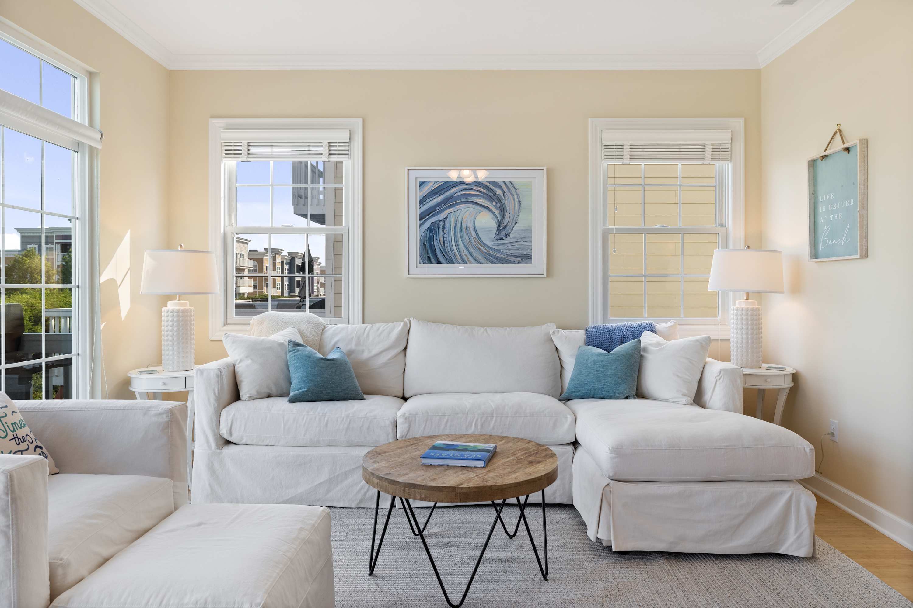 Table lamps and soft seating make the living room easy to use after dark.