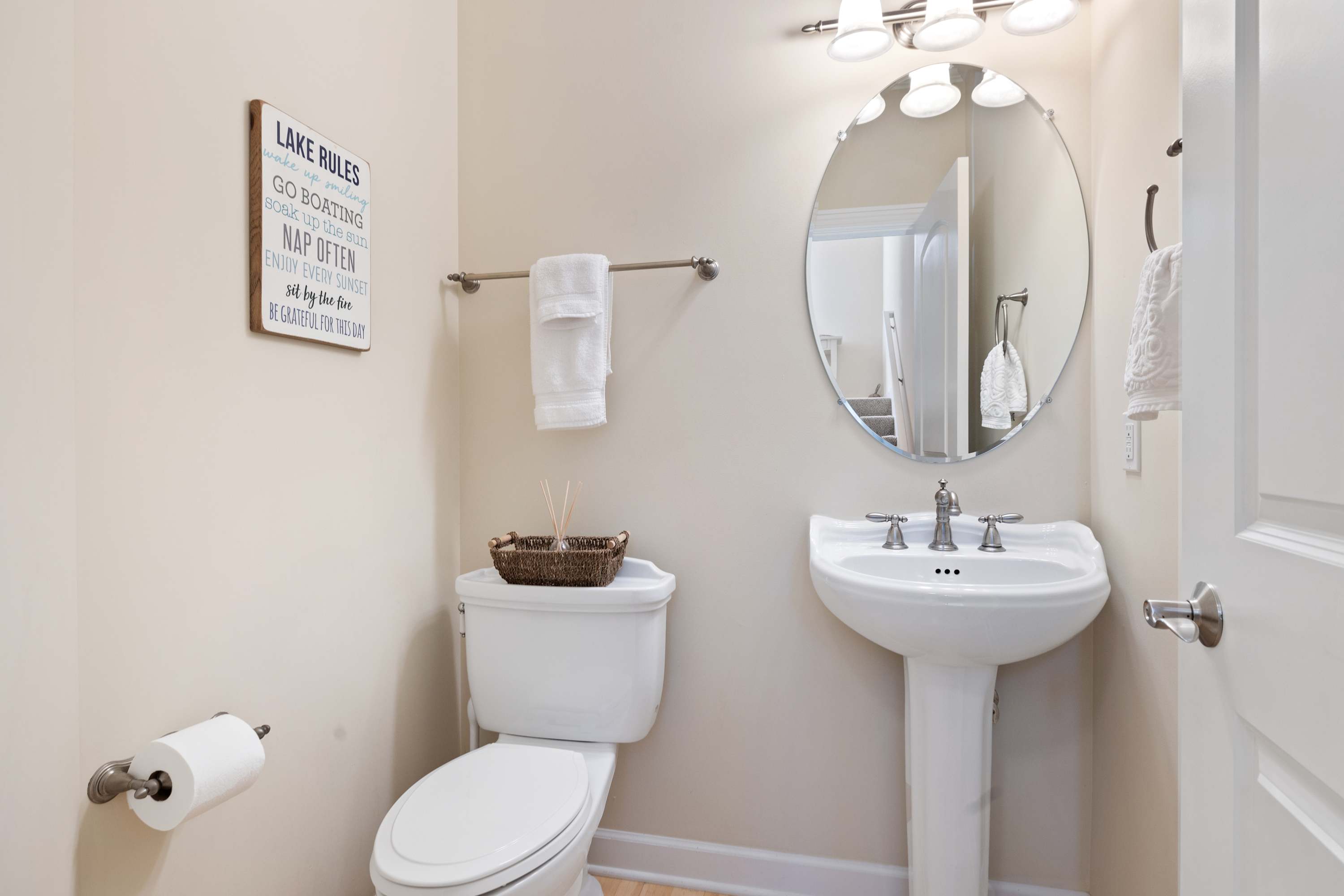 Extra half bath that keeps the full bathrooms free for showers.