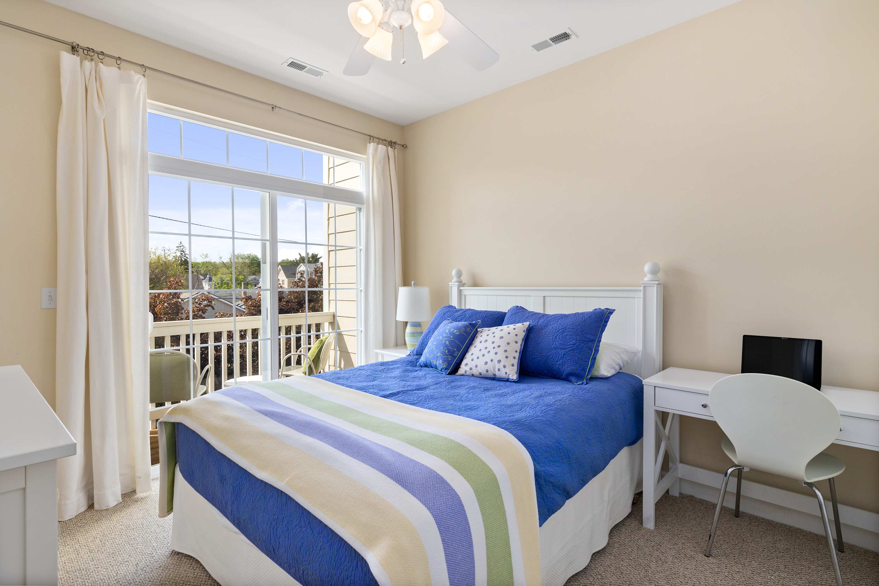Bedroom 2 is on the 3rd floor and has a queen-sized bed.
