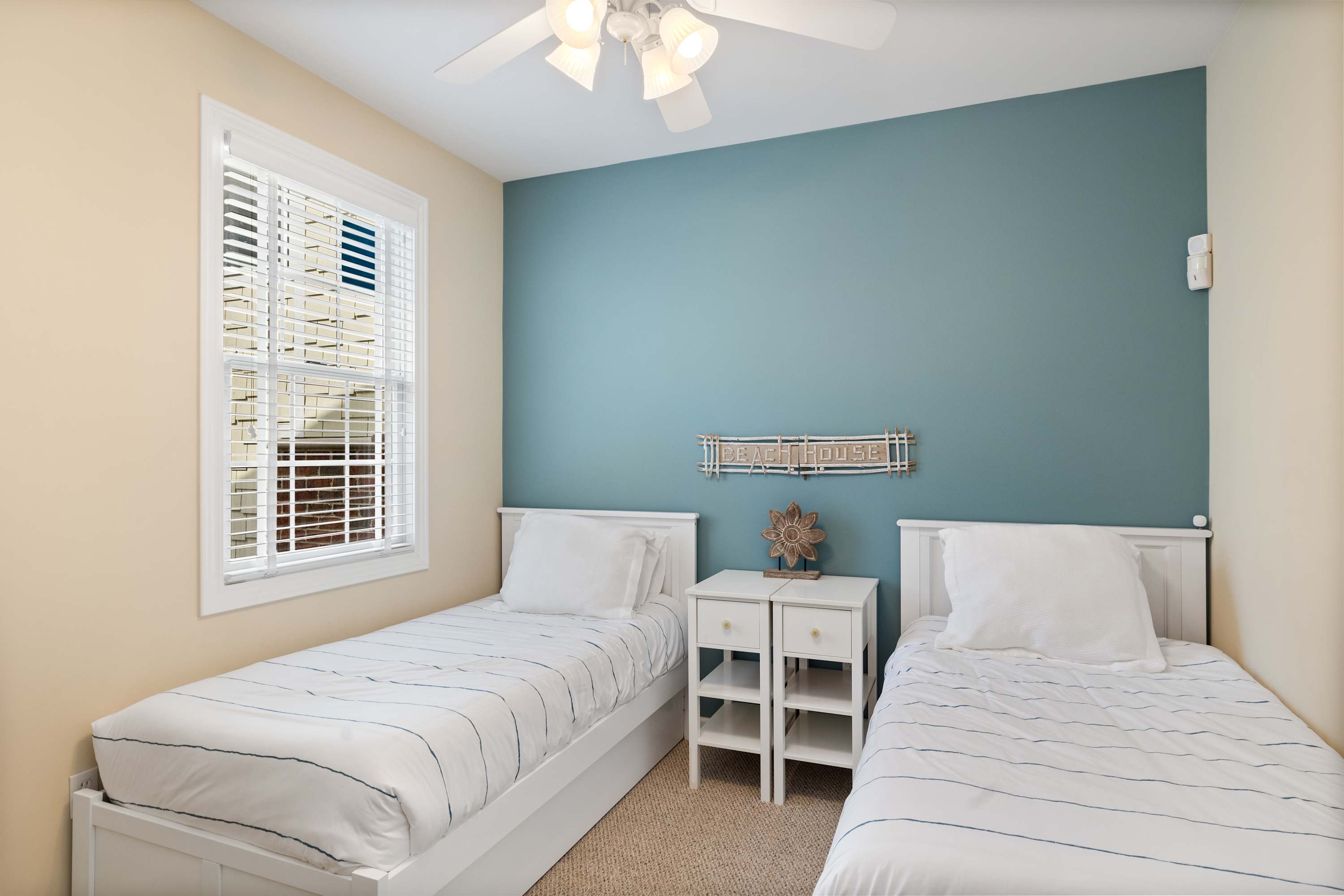 Bedroom 3 is on the ground floor and has 2 single beds and a trundle bed.