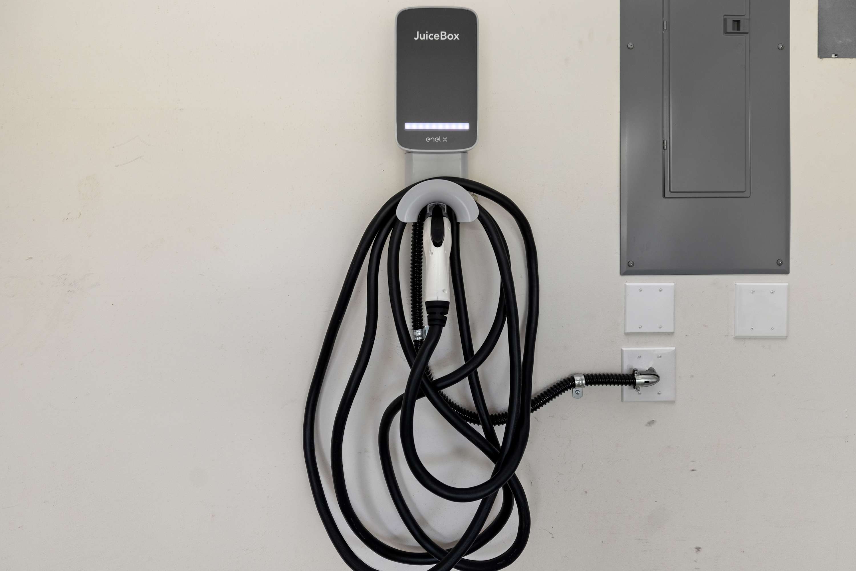 Garage EV charger for electric vehicle owners staying at Sea Glass.