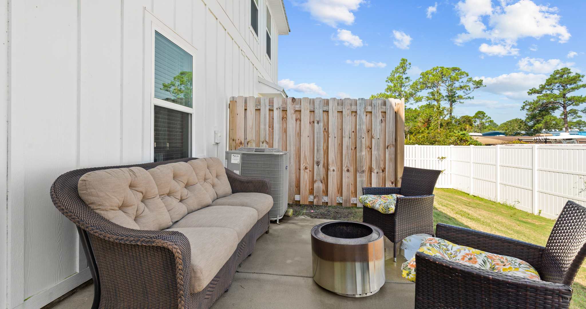 Sip morning coffee or an evening cocktail on the back patio​