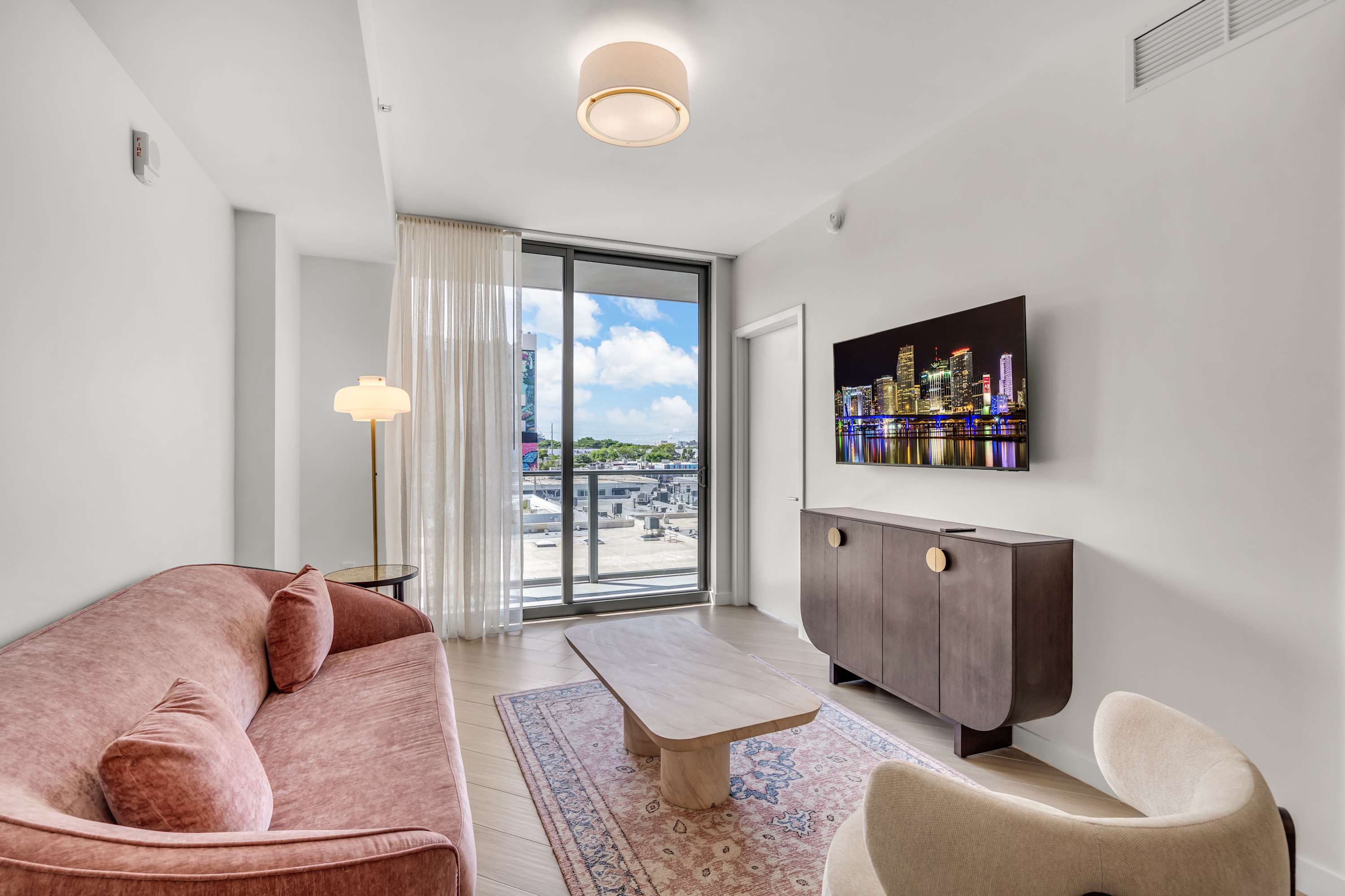 Unwind in the stylish living room & stream your favorites on the smart TV​