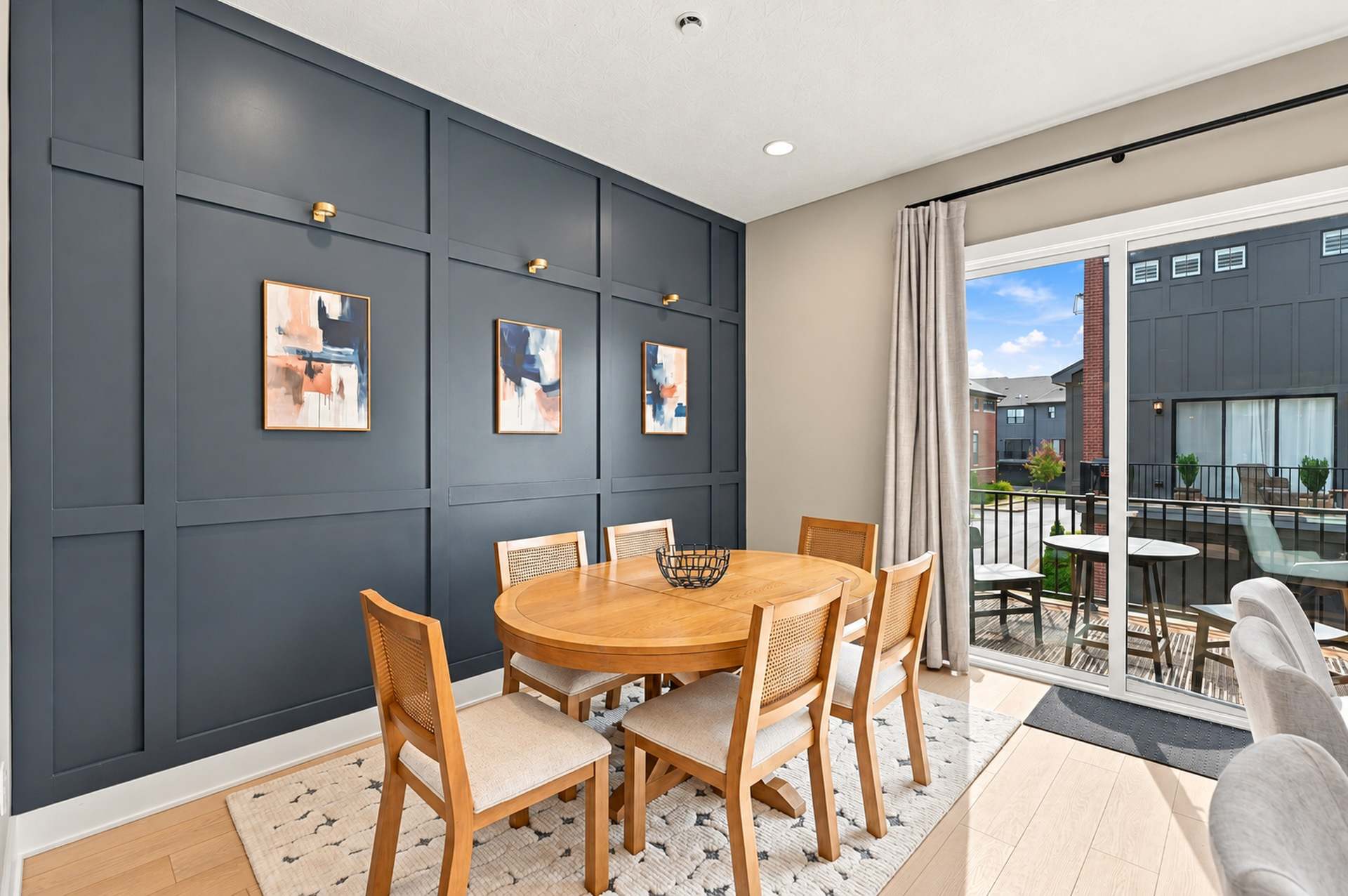 The dining area opens to the deck for an easy connection outdoors