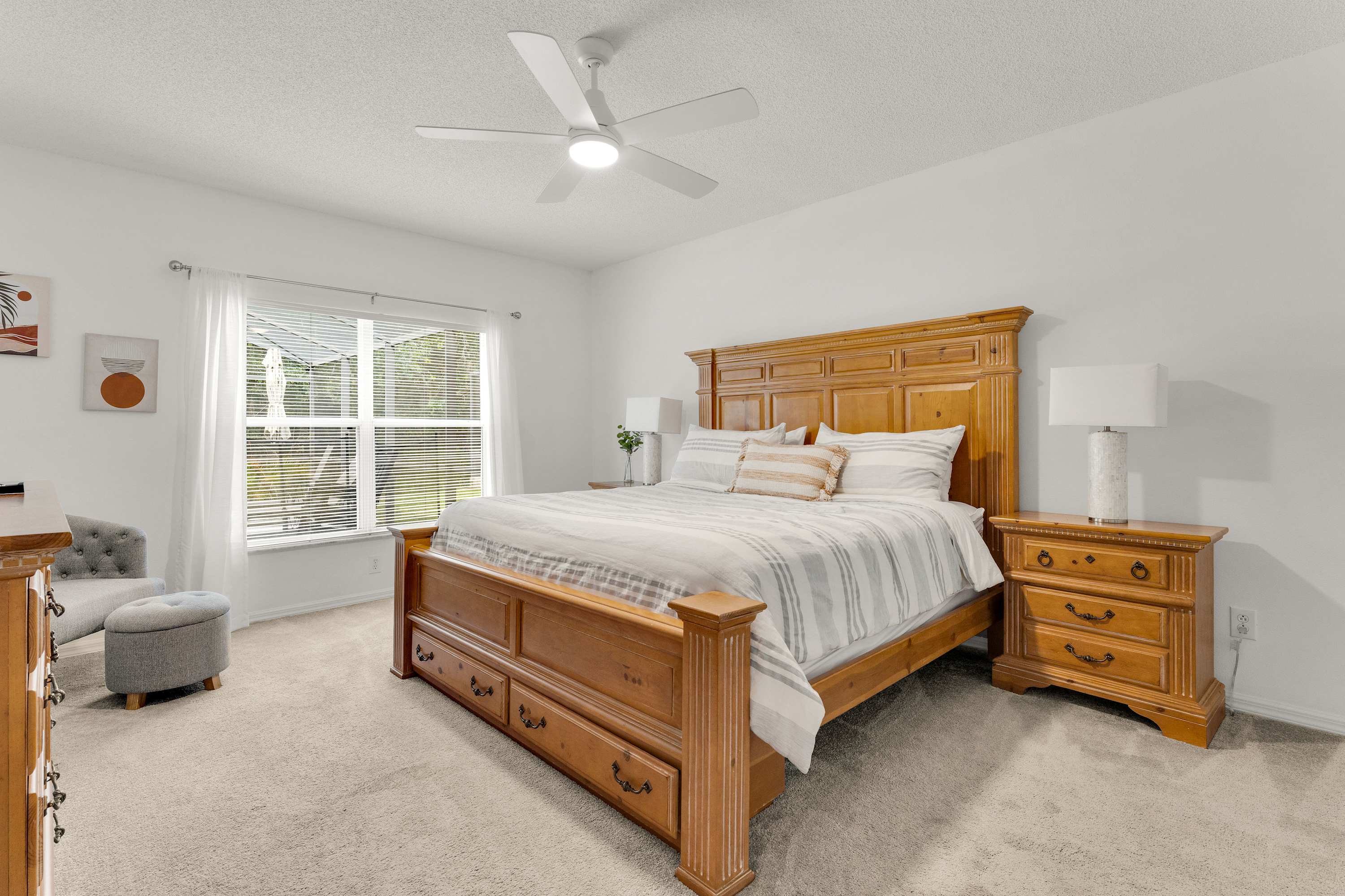 Enjoy a restful stay in the king bedroom with a Smart TV, private ensuite, and additional seating
