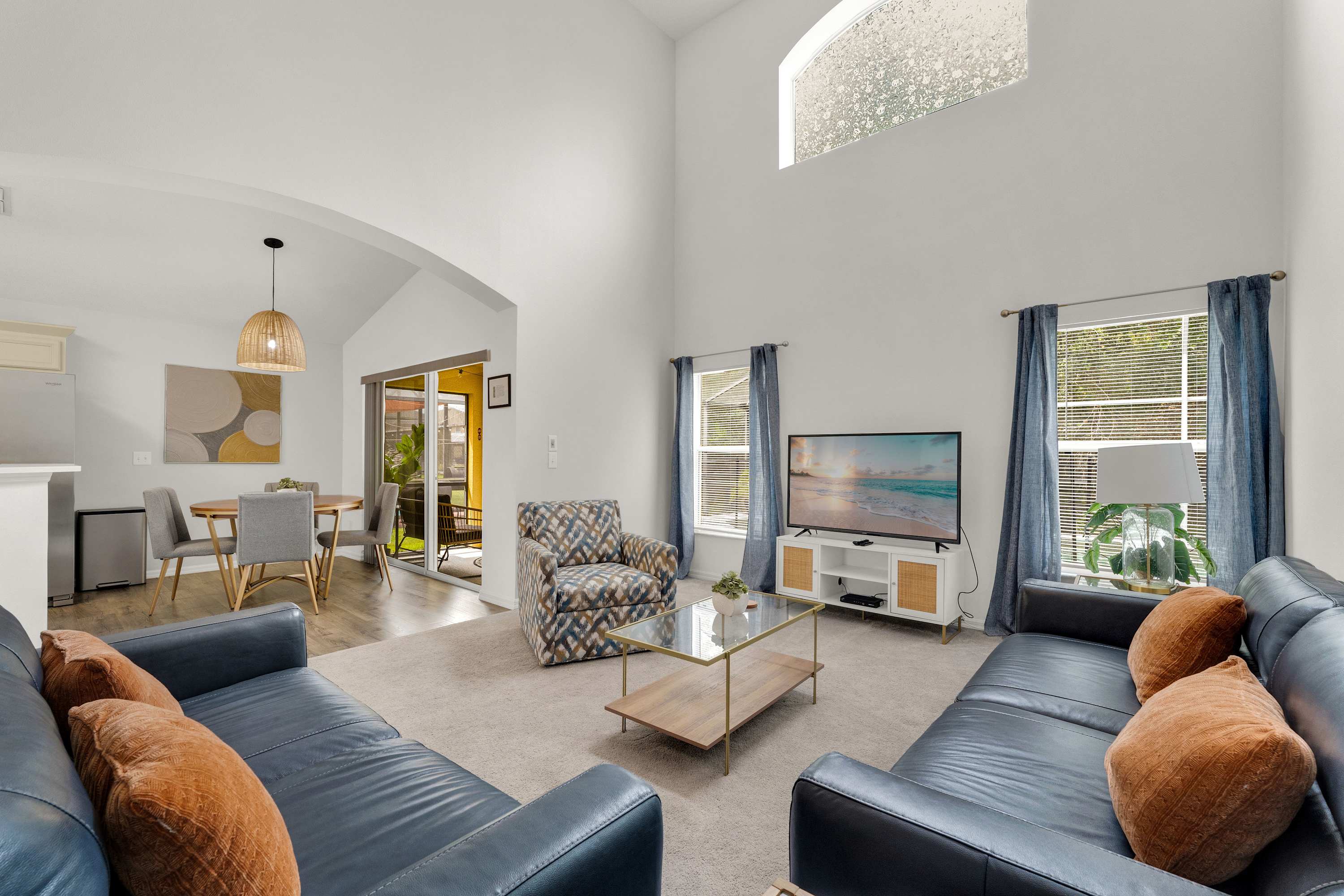 Enjoy movie nights in the living room with a Smart TV and two couches
