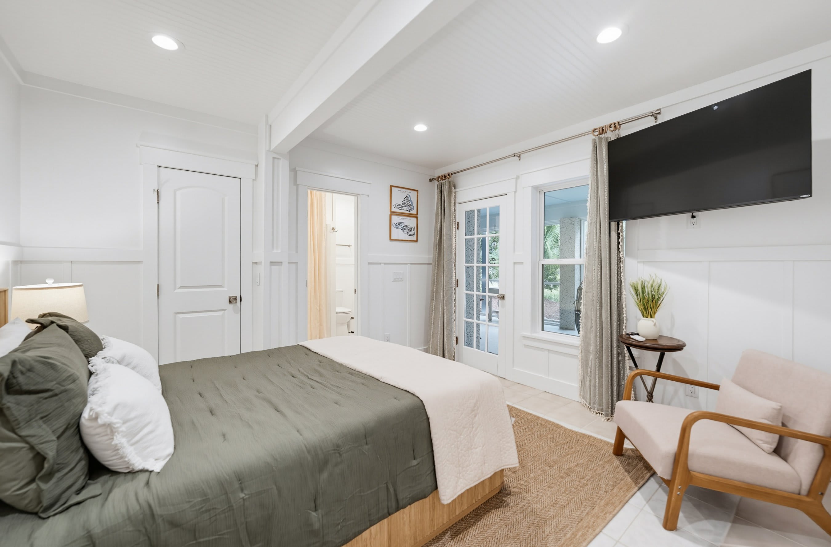 Ground Level Queen Bedroom with Full En Suite Bathroom and Access to Screened Patio