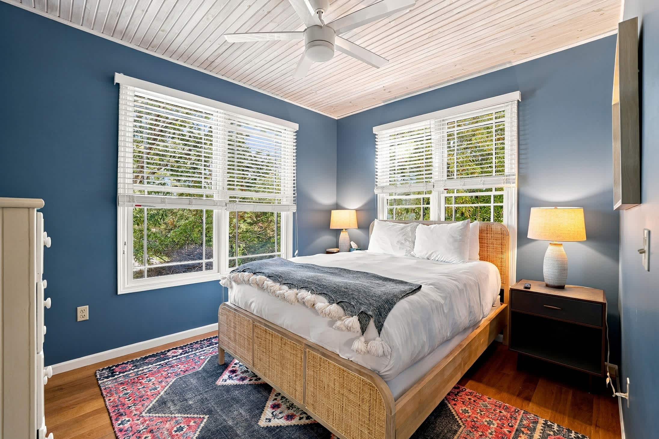 Bedroom 2 is on the main level & has a queen-size bed.