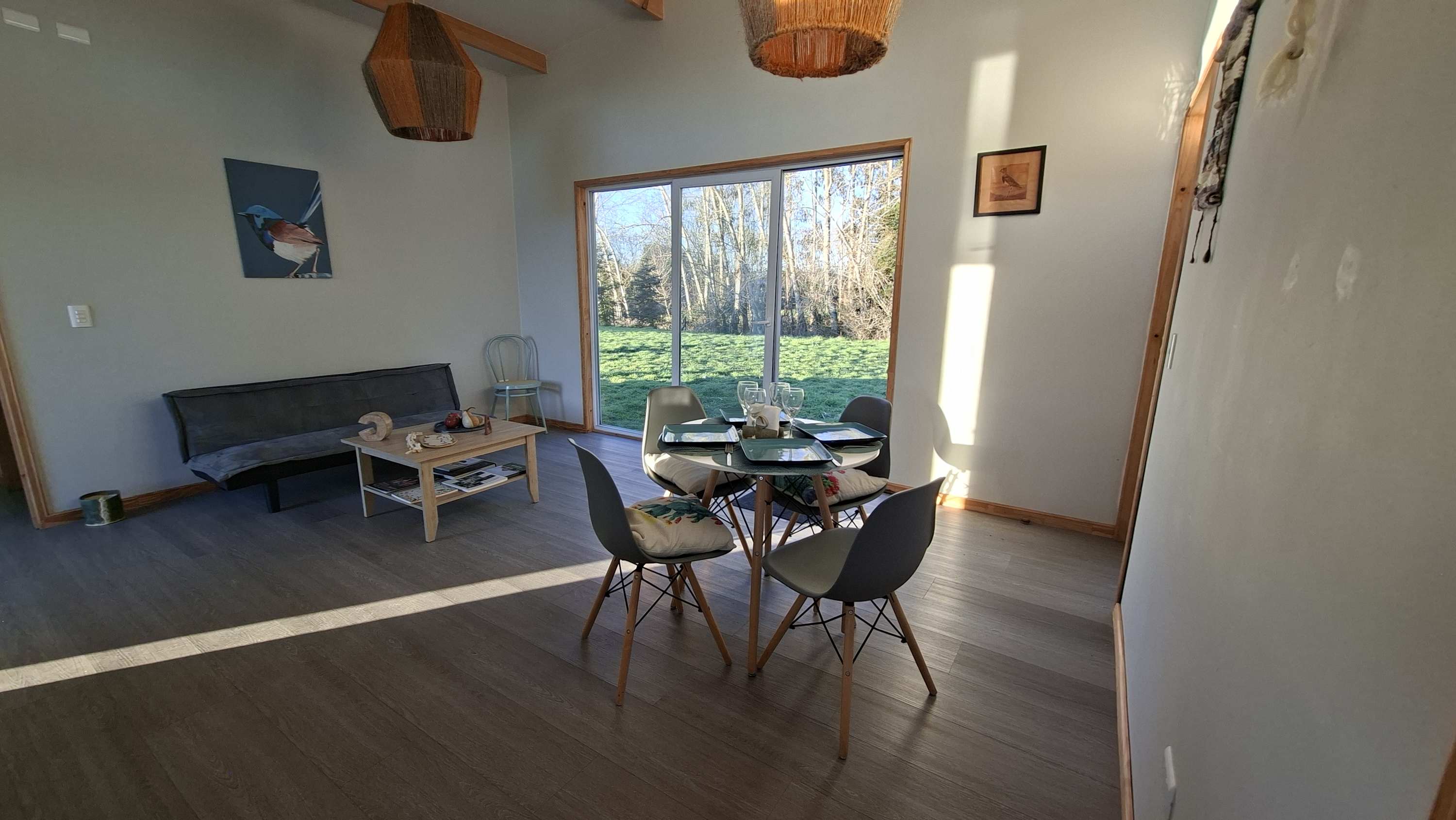 Open-plan living and dining area with garden access