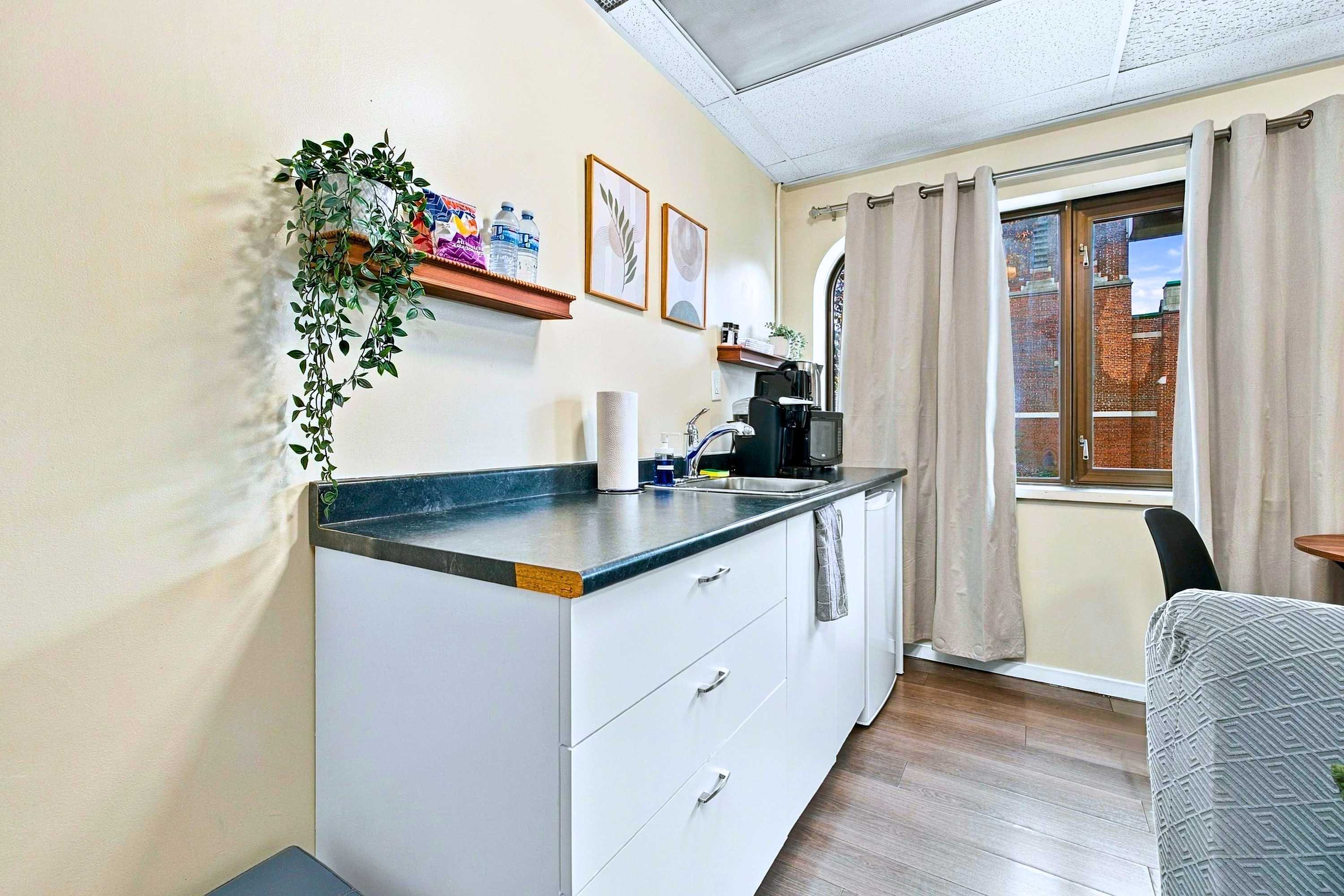Enjoy home-cooked meals in this sleek, convenient kitchen.