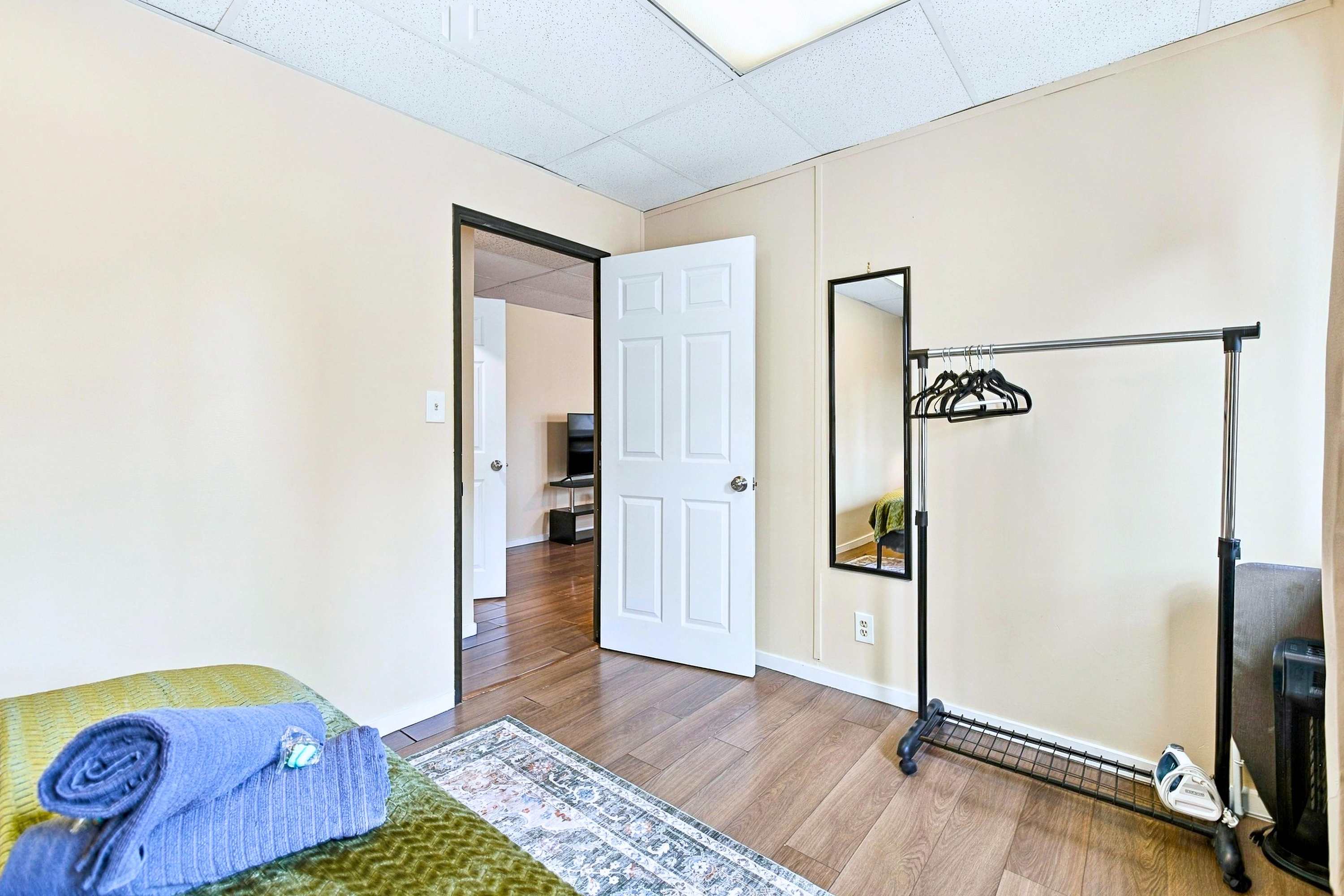 Keep your outfits crisp with this handy mirror and hanging nook.
