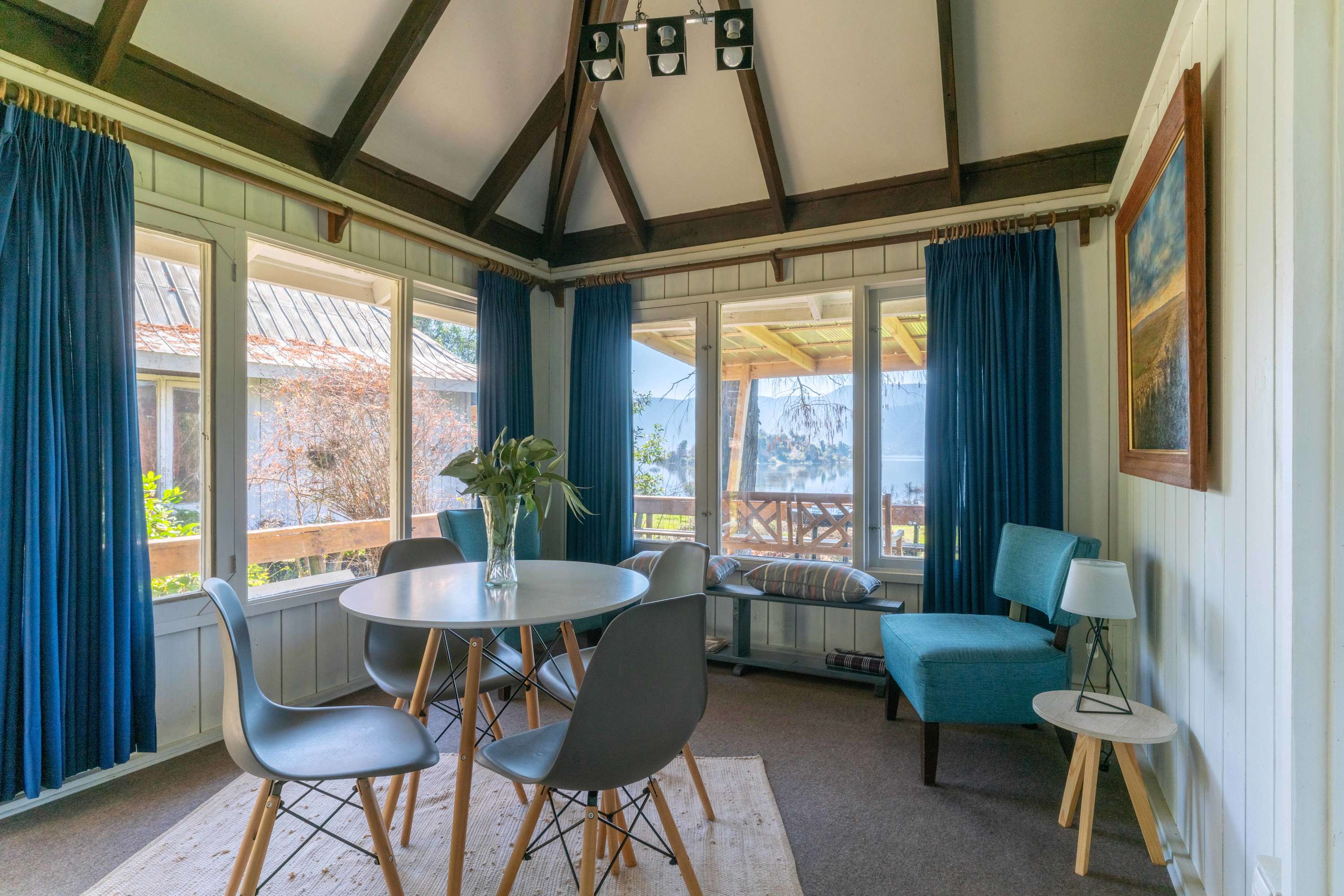 Living and dining area with windows facing the lagoon