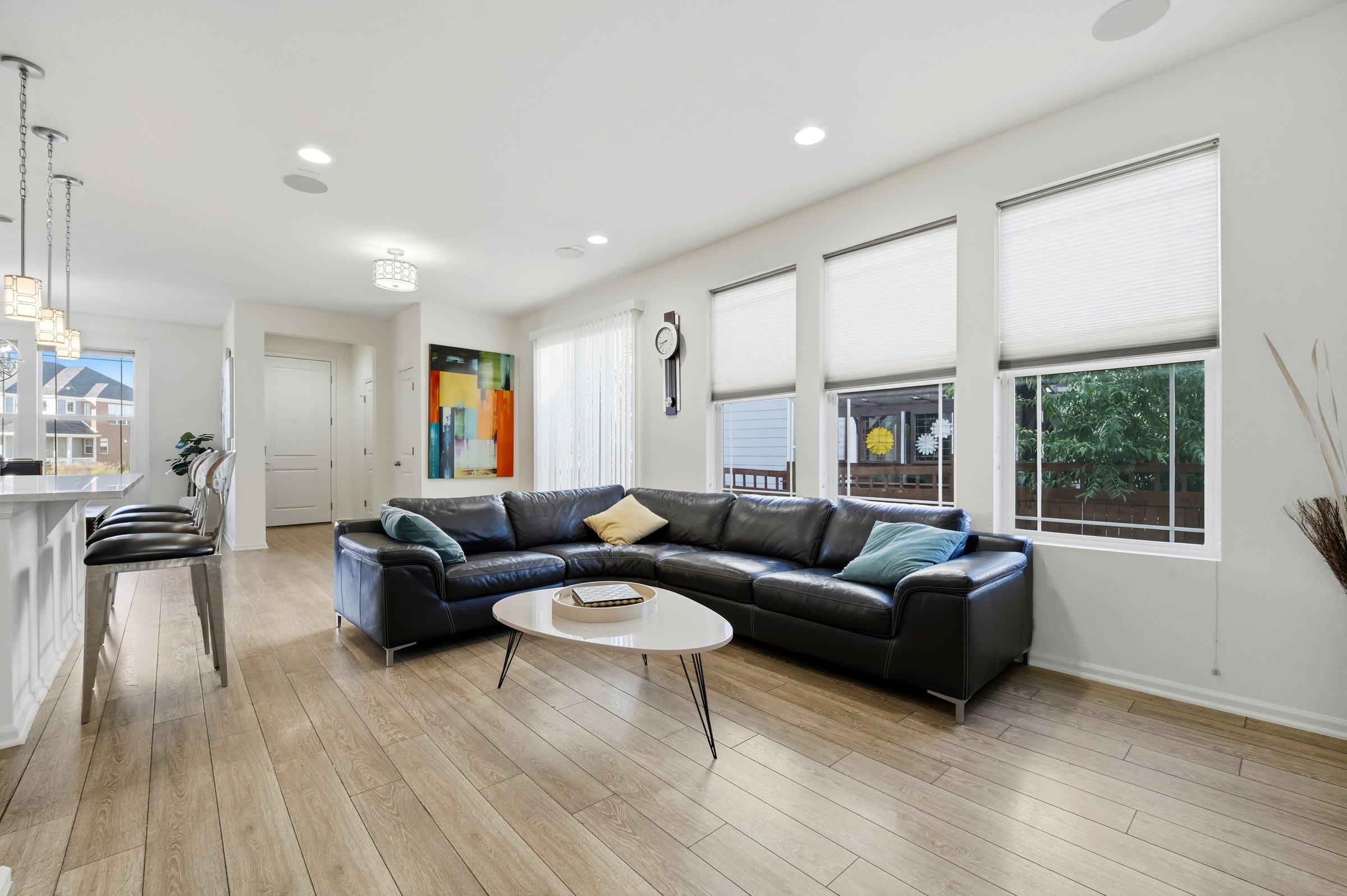 Large sitting area with a beautiful Scandinavian sectional couch. Perfect to sit and relax and watch a movie with a glass of wine and a surround sound system.