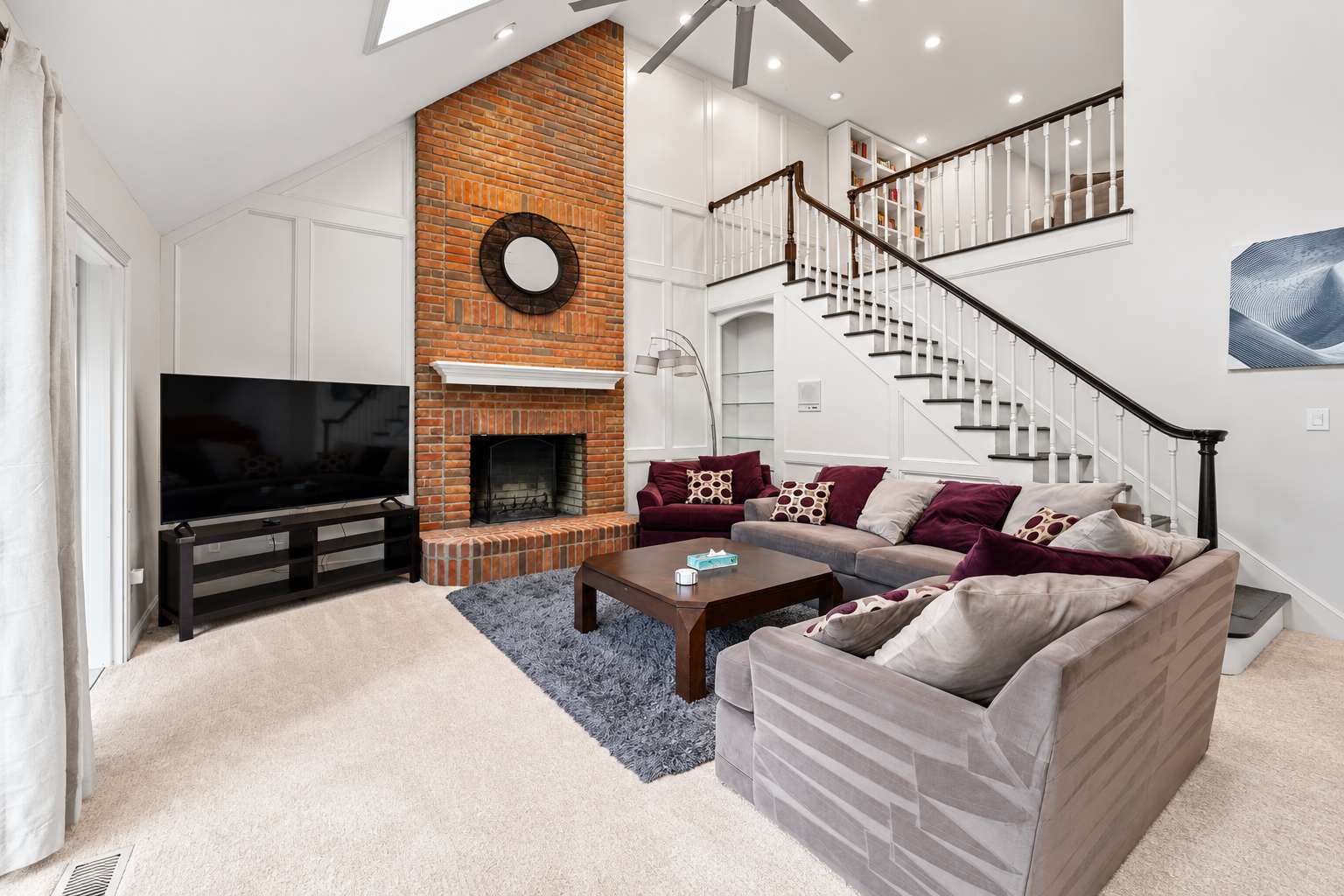 Curl up in the elegant living room & stream your favorites on the smart TV​