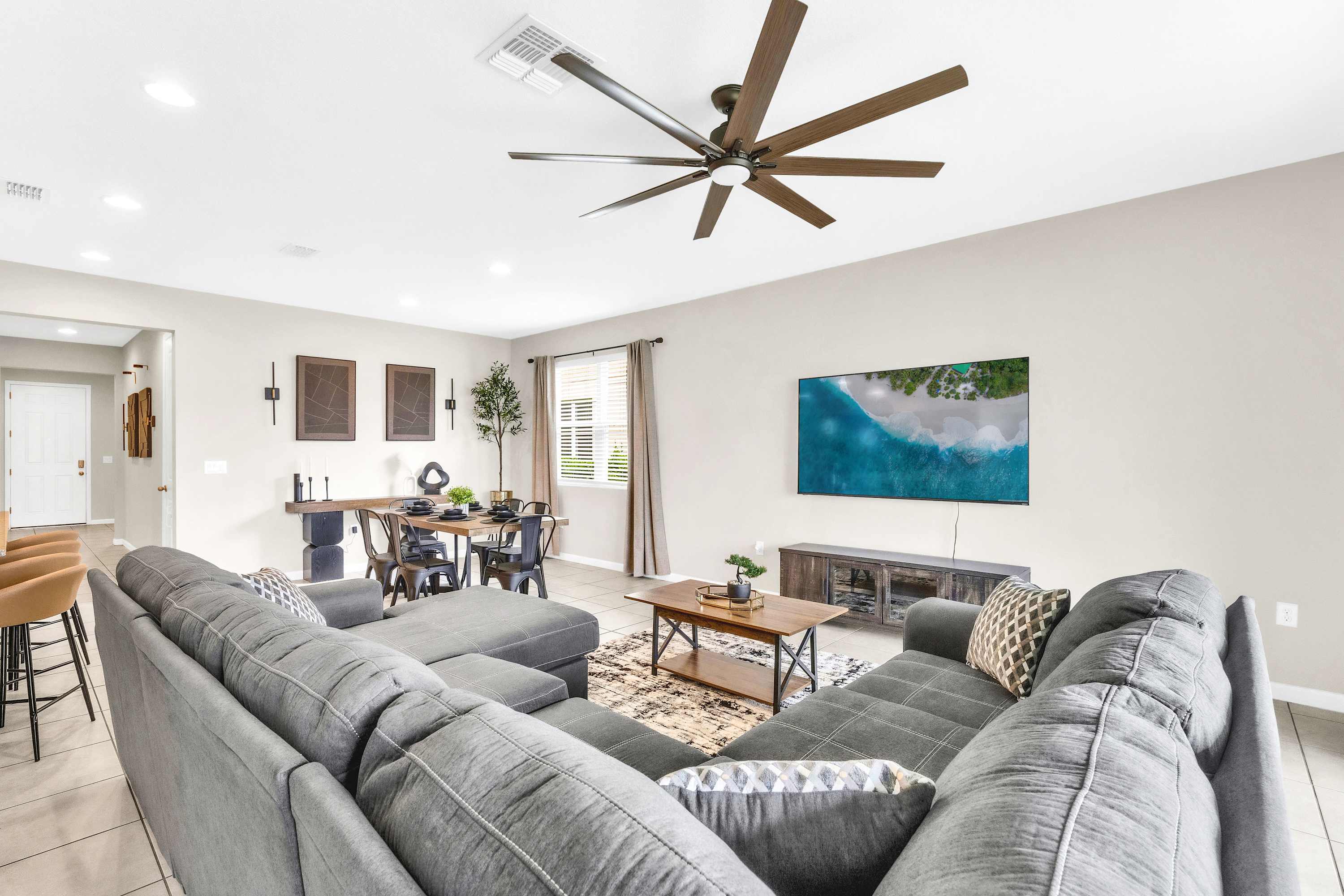 Gather and unwind with comfortable sectional seating, a Smart TV, and dining for 6​