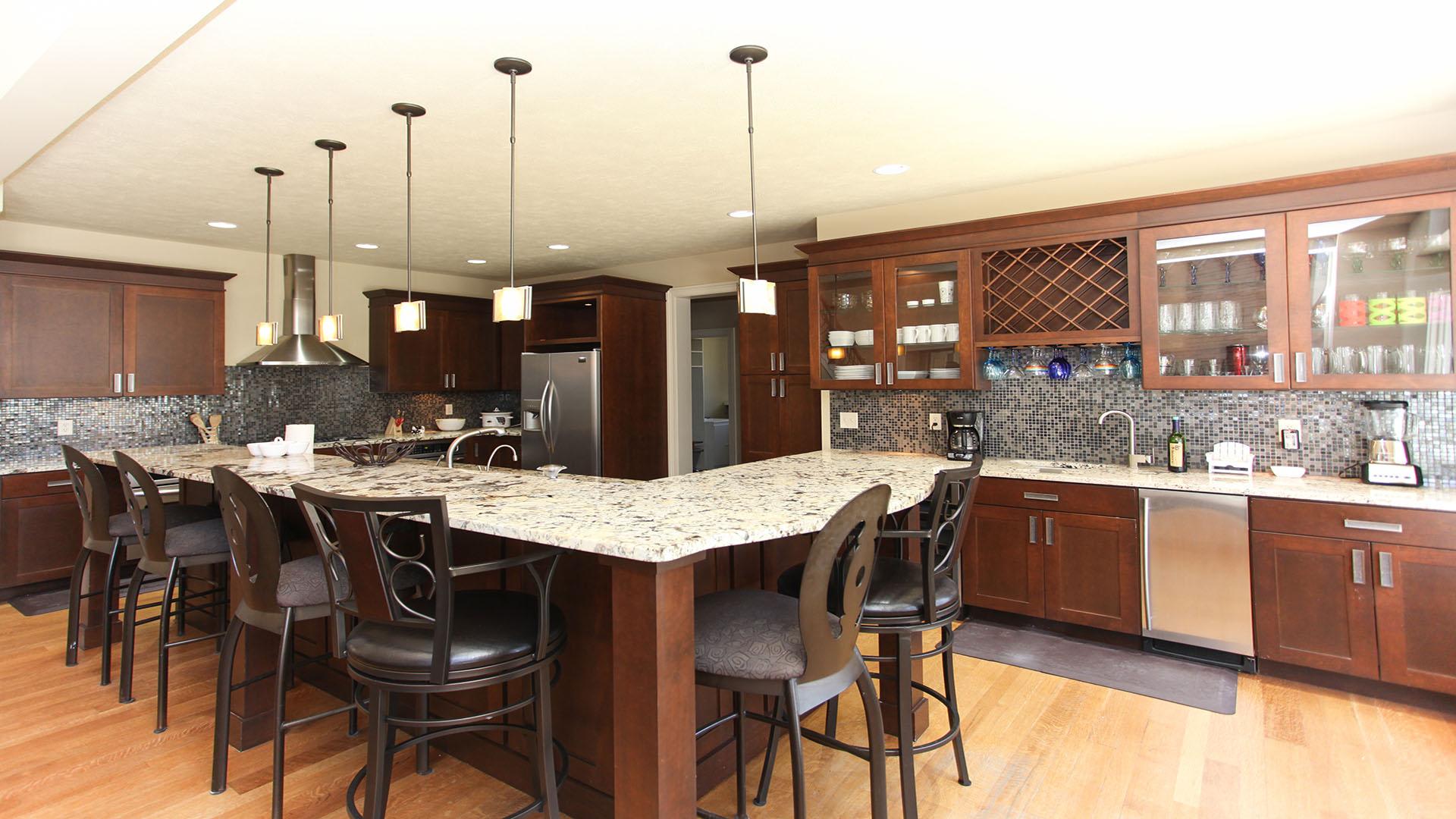 Open kitchen with a large island and dining space
