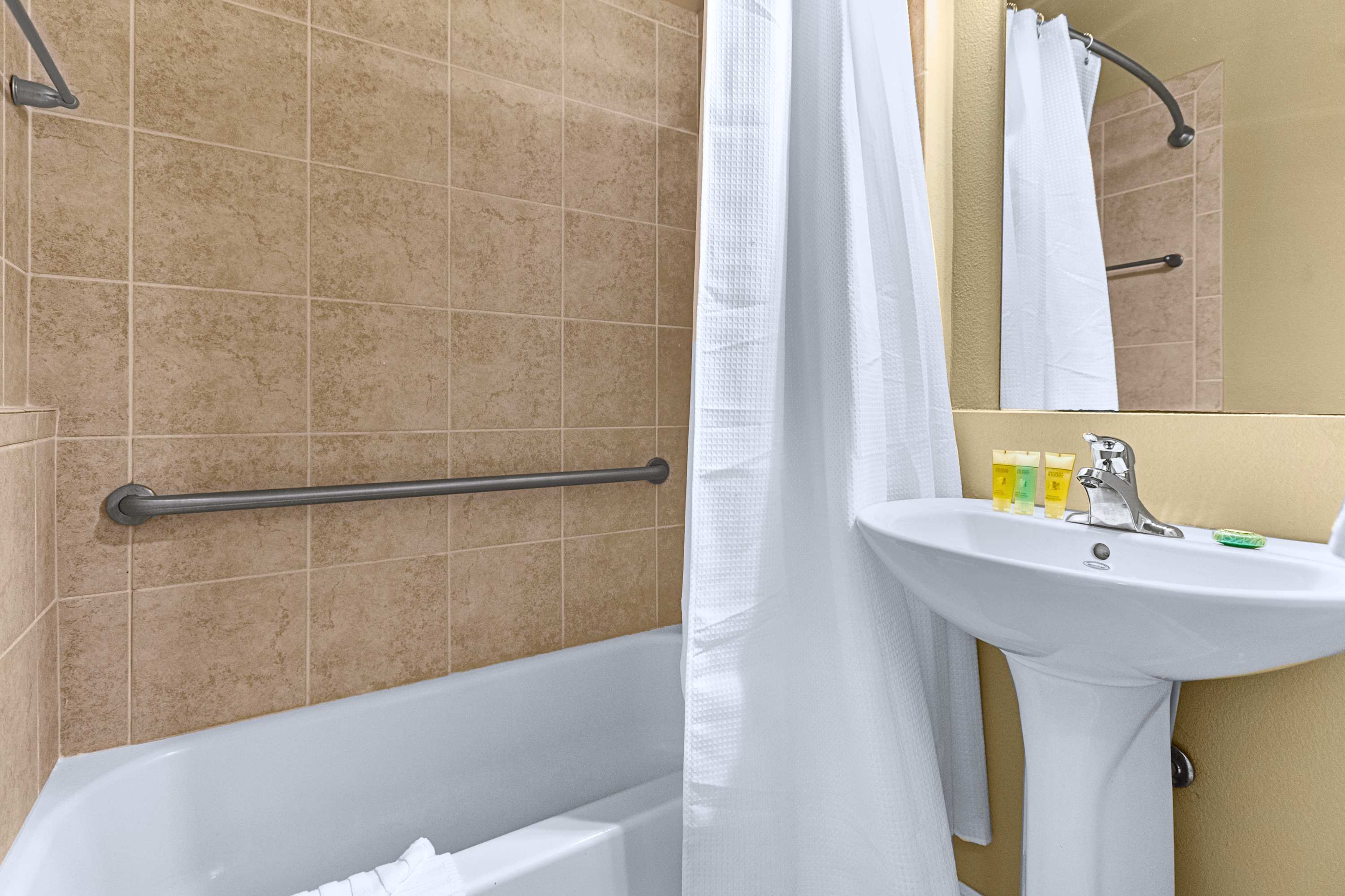 A well-appointed bathroom equipped with modern fixtures and crisp towels