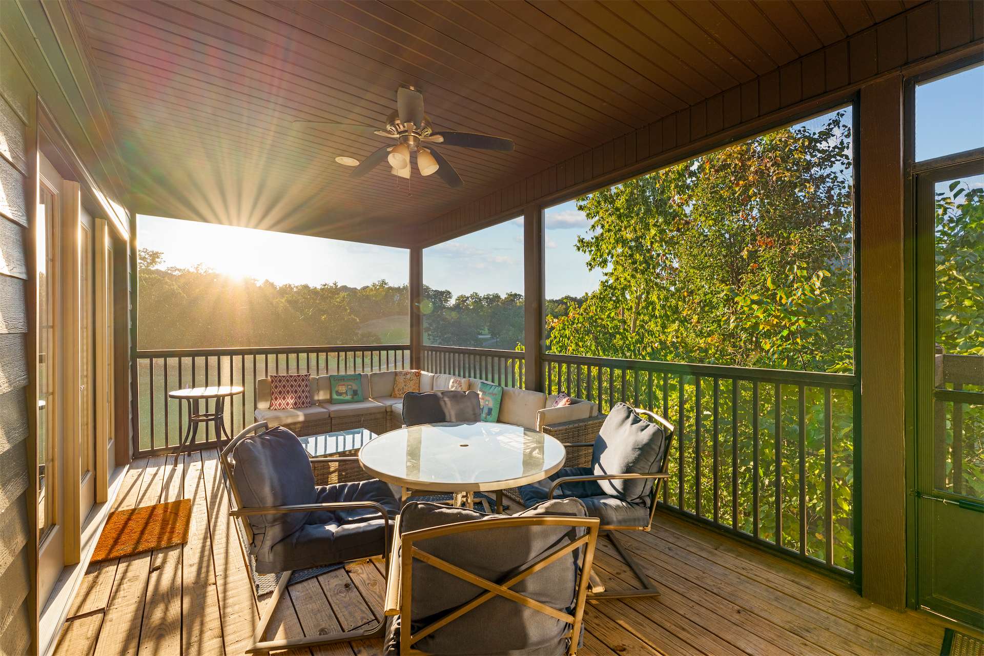 Enjoy peaceful mornings and relaxing evenings on the screened-in porch with a sectional couch and table for 4