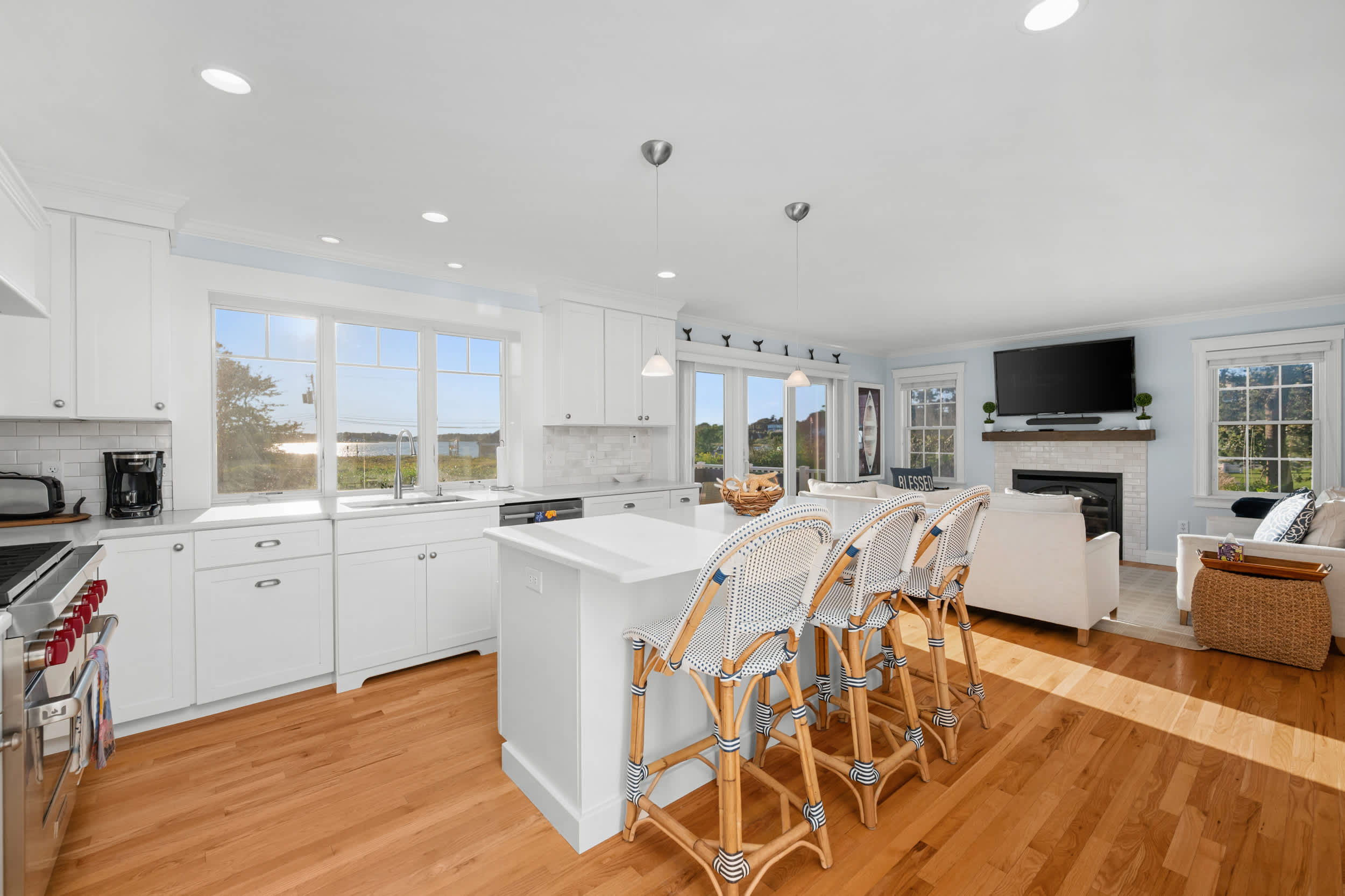 Enjoy easy meal prep and casual dining with generous counter space, island seating and a view.