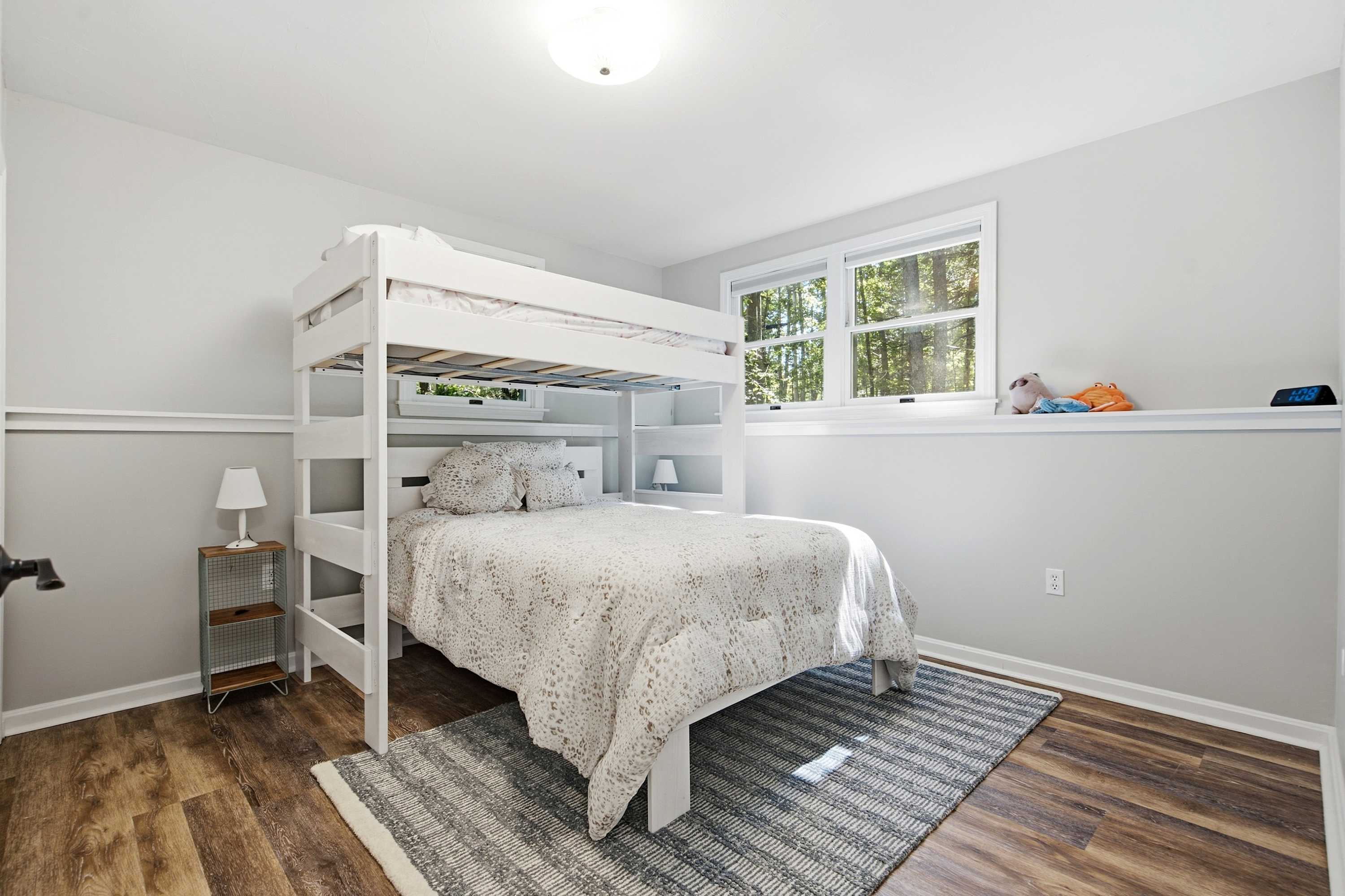 Make room for everyone with a twin-over-full bunk bed in this cozy bedroom