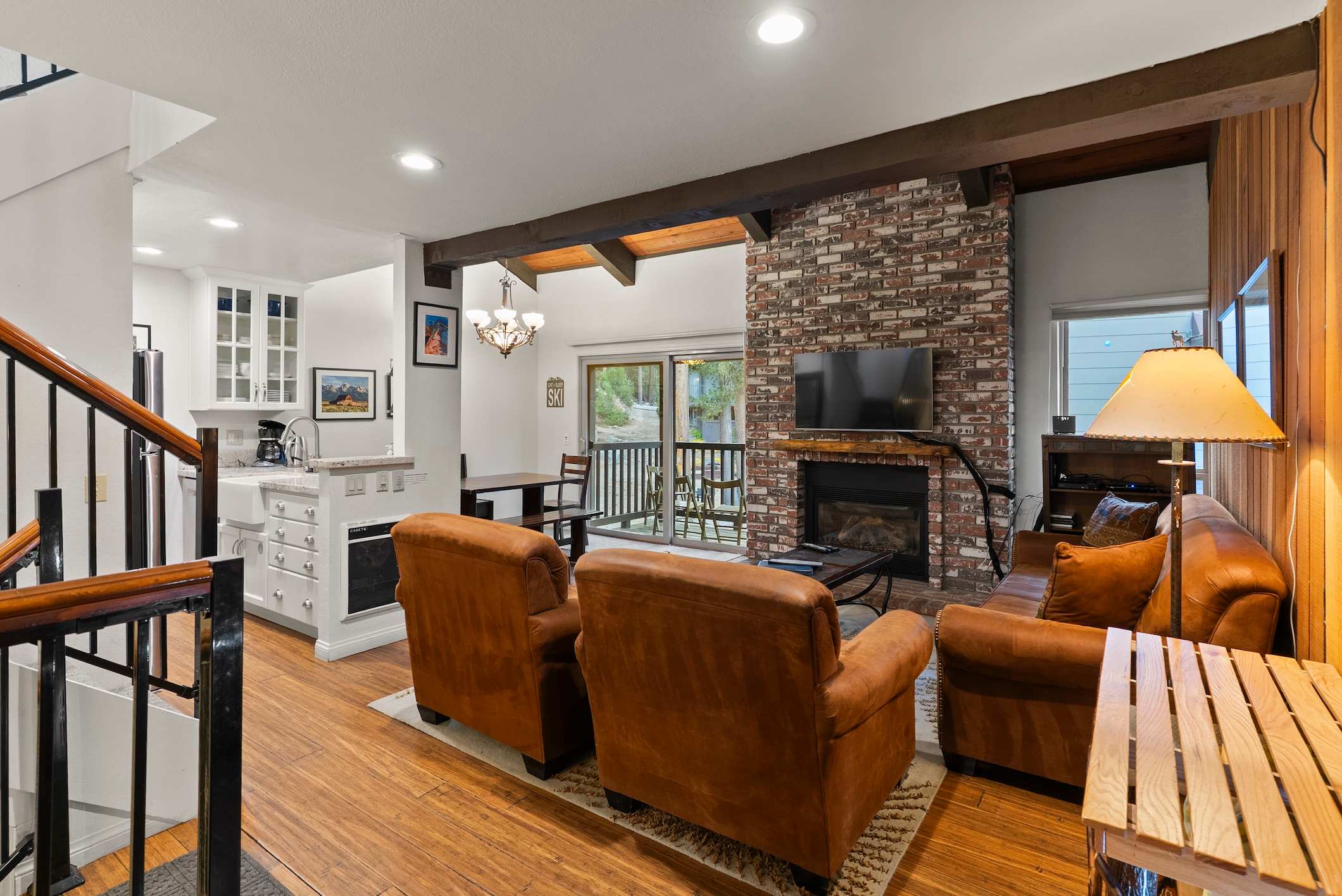 Living room with flat screen TV, gas fireplace and comfortable seating