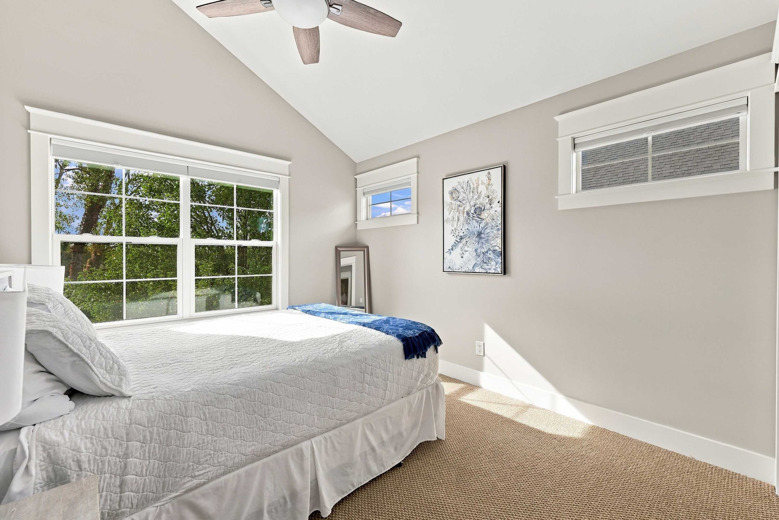 Room to unpack and unwind in a sunny second bedroom near Lake Michigan.
