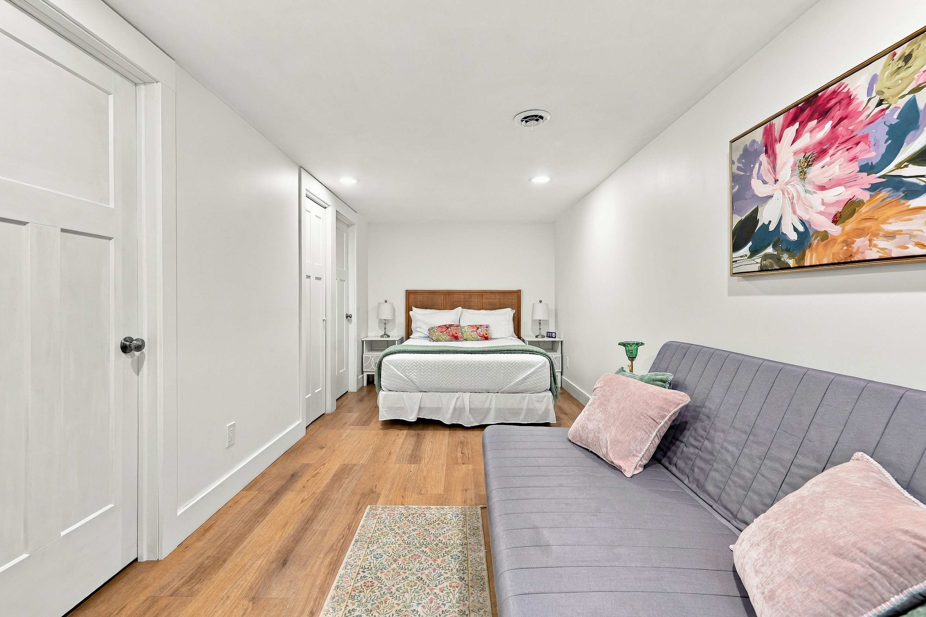 Bedroom 4 is on the lower level and has a queen-sized bed and a futon.