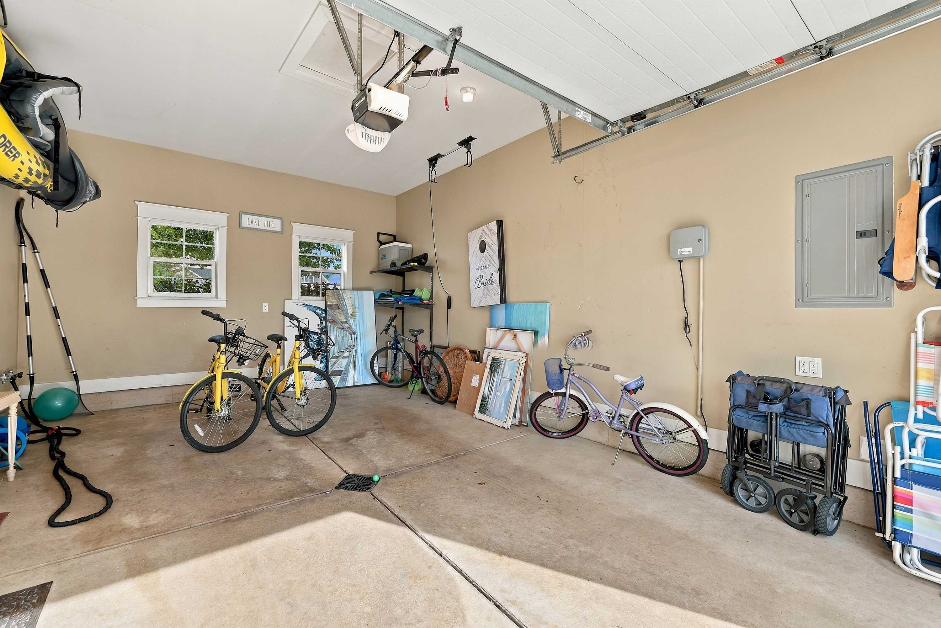 Bikes, beach chairs, and a wagon are ready in the Benton Harbor garage.