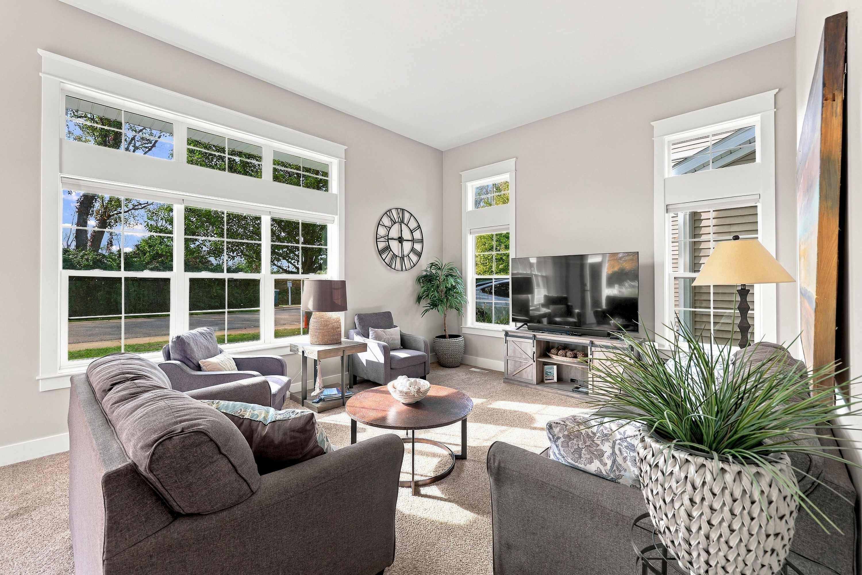 Tall windows and a big TV for easy downtime after a day at the beach.