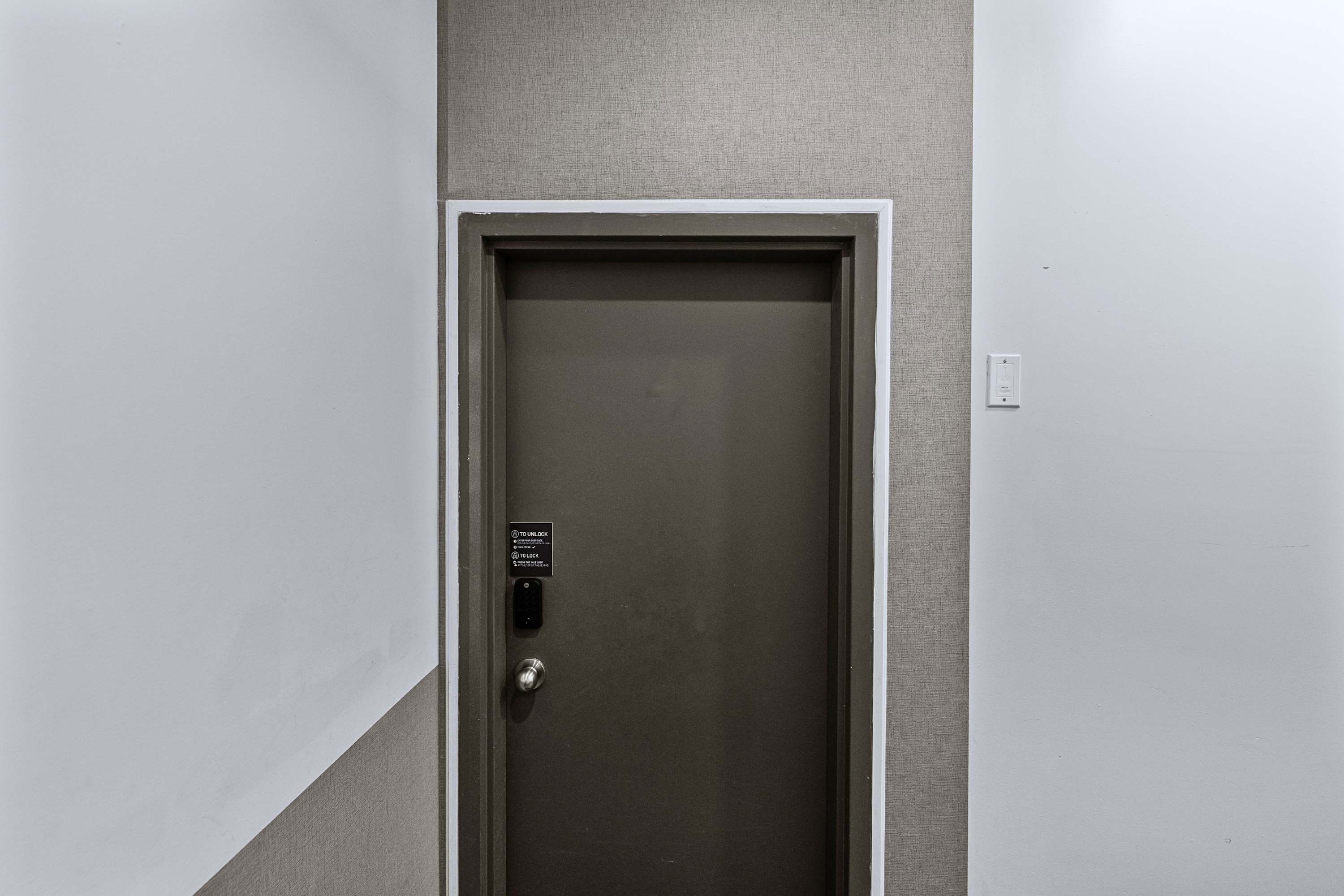 A sleek modern interior door equipped with a secure digital keyless lock