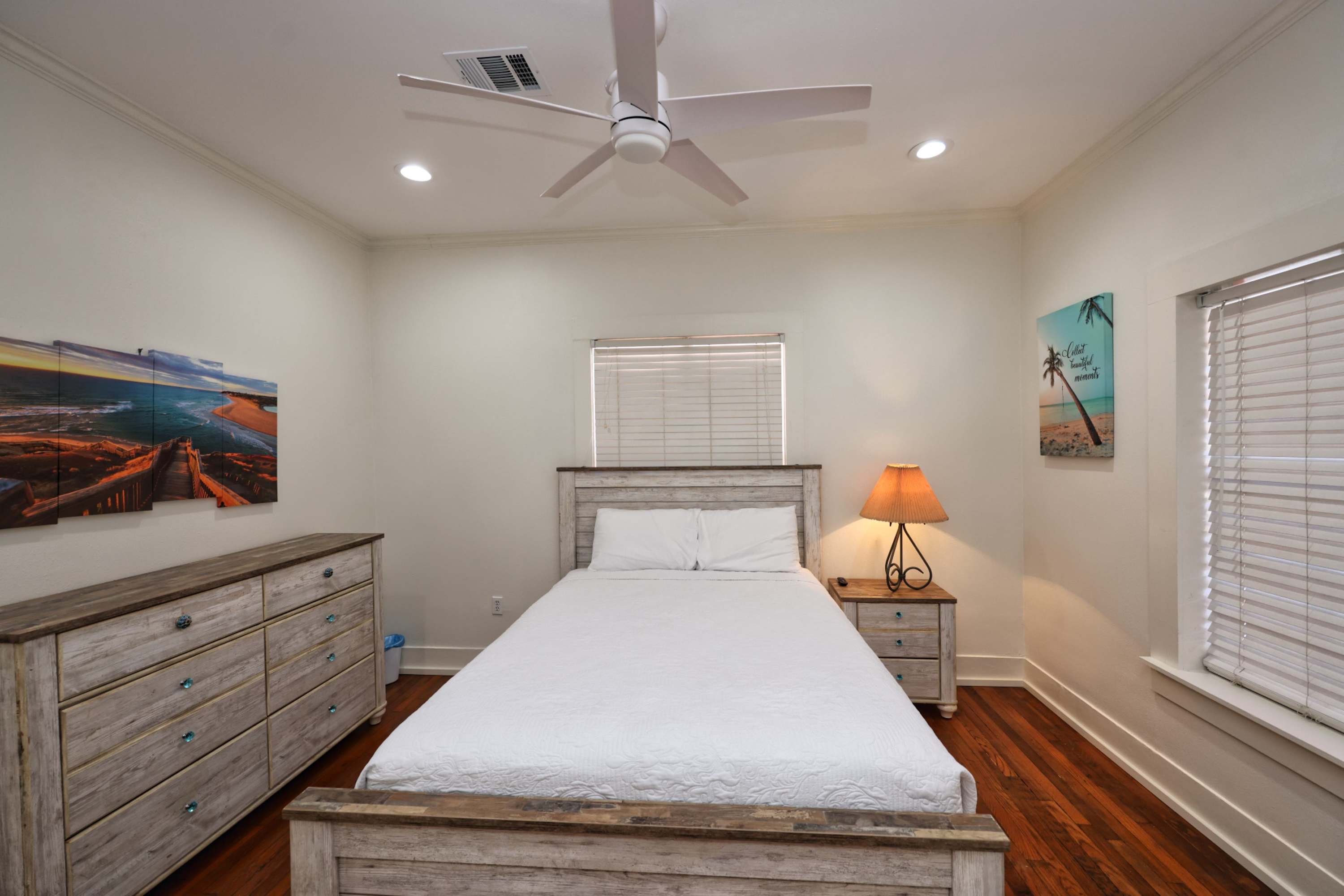 Cozy queen bedroom featuring a Smart TV for your entertainment​