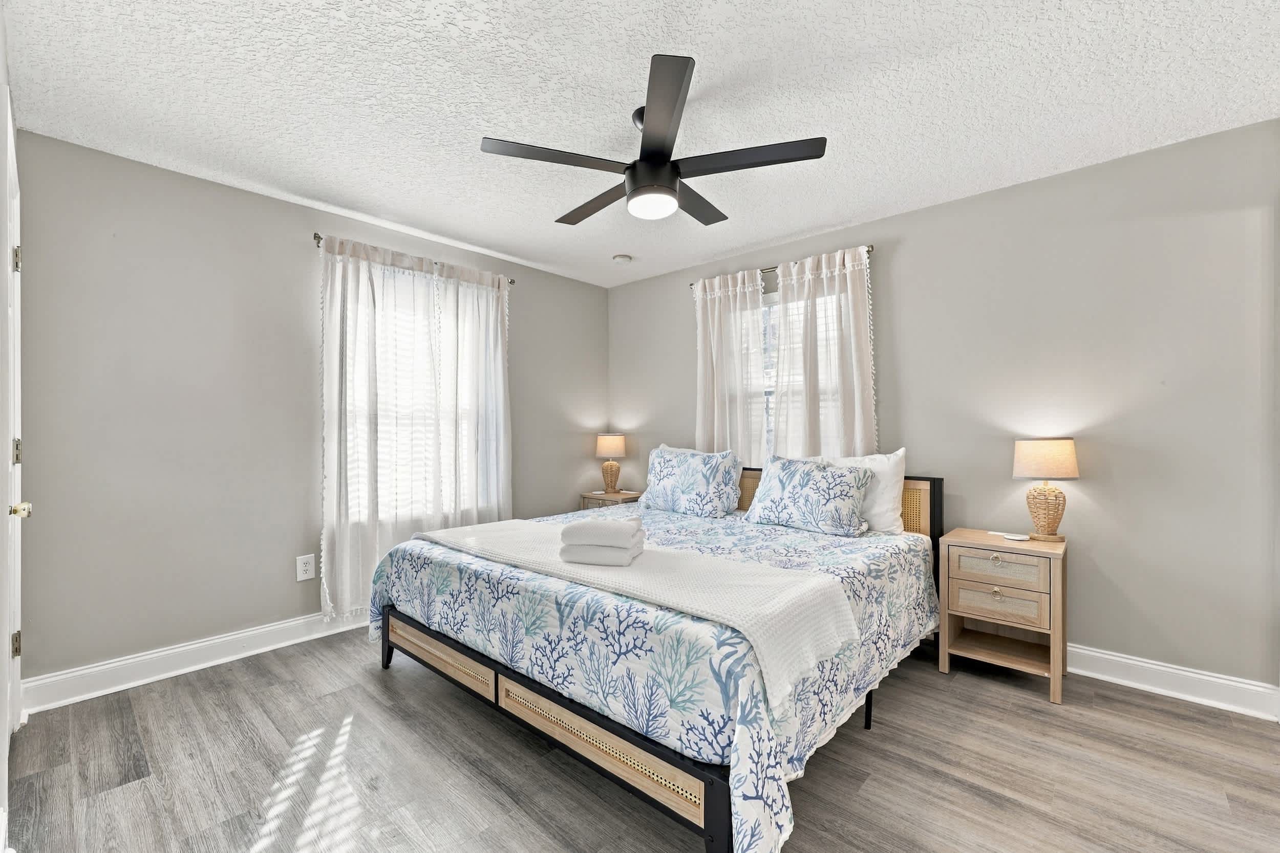 Comfortable queen bedroom featuring a private ensuite bathroom​