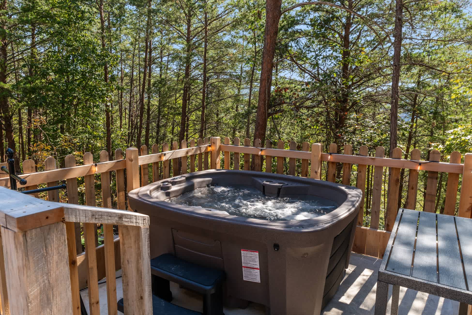 Soak under the stars in the private hot tub