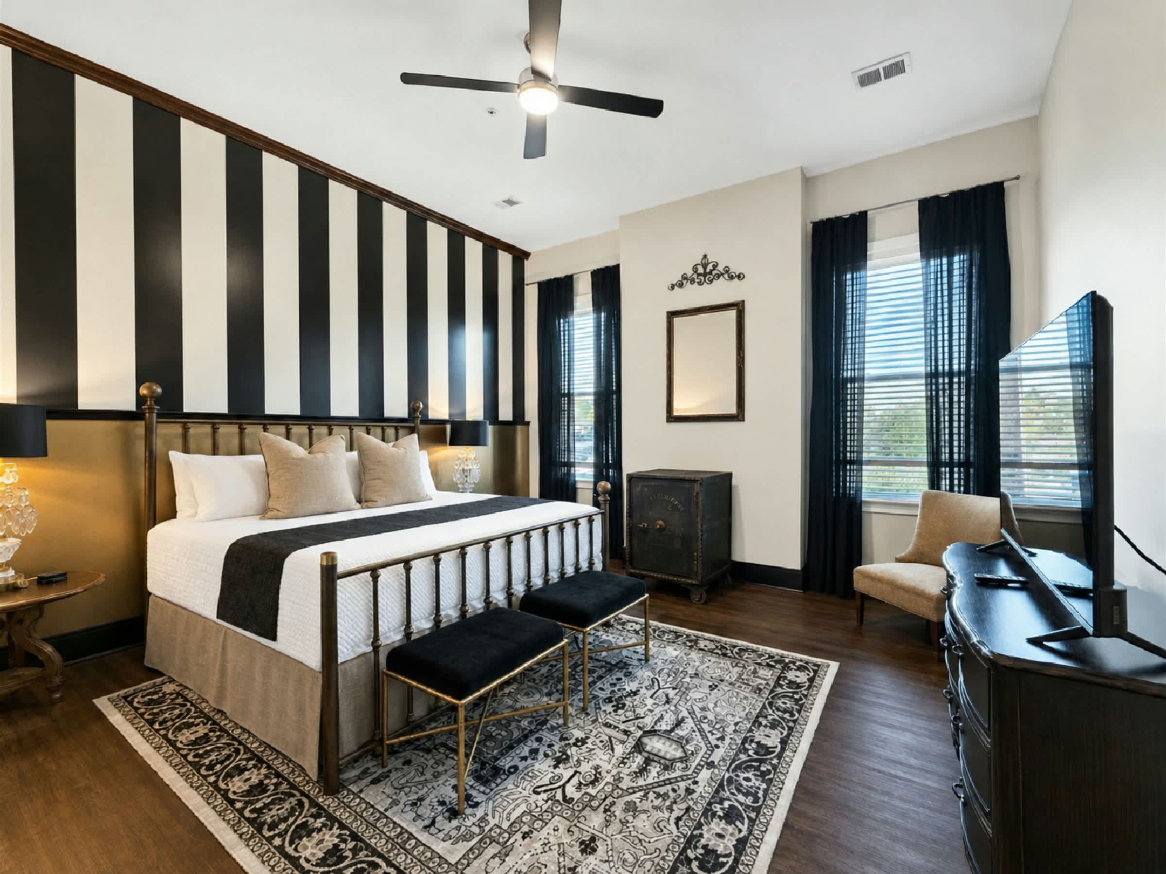 Recharge in the bedroom retreat, featuring a king bed & smart TV​